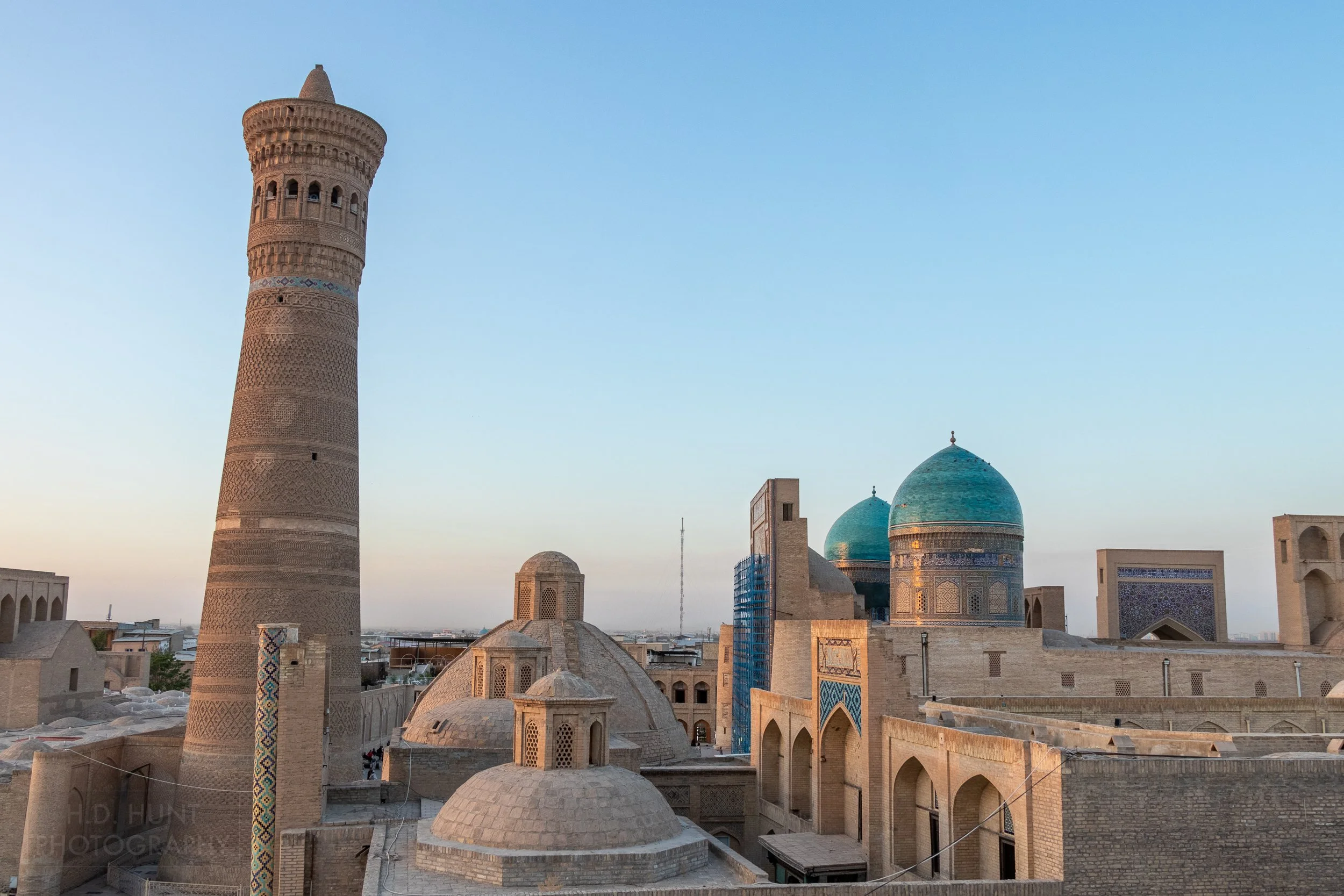 A view of the Po-i-Kalan square, prominently featuring the Kalan Minaret, in Bukhara, Uzbekistan.