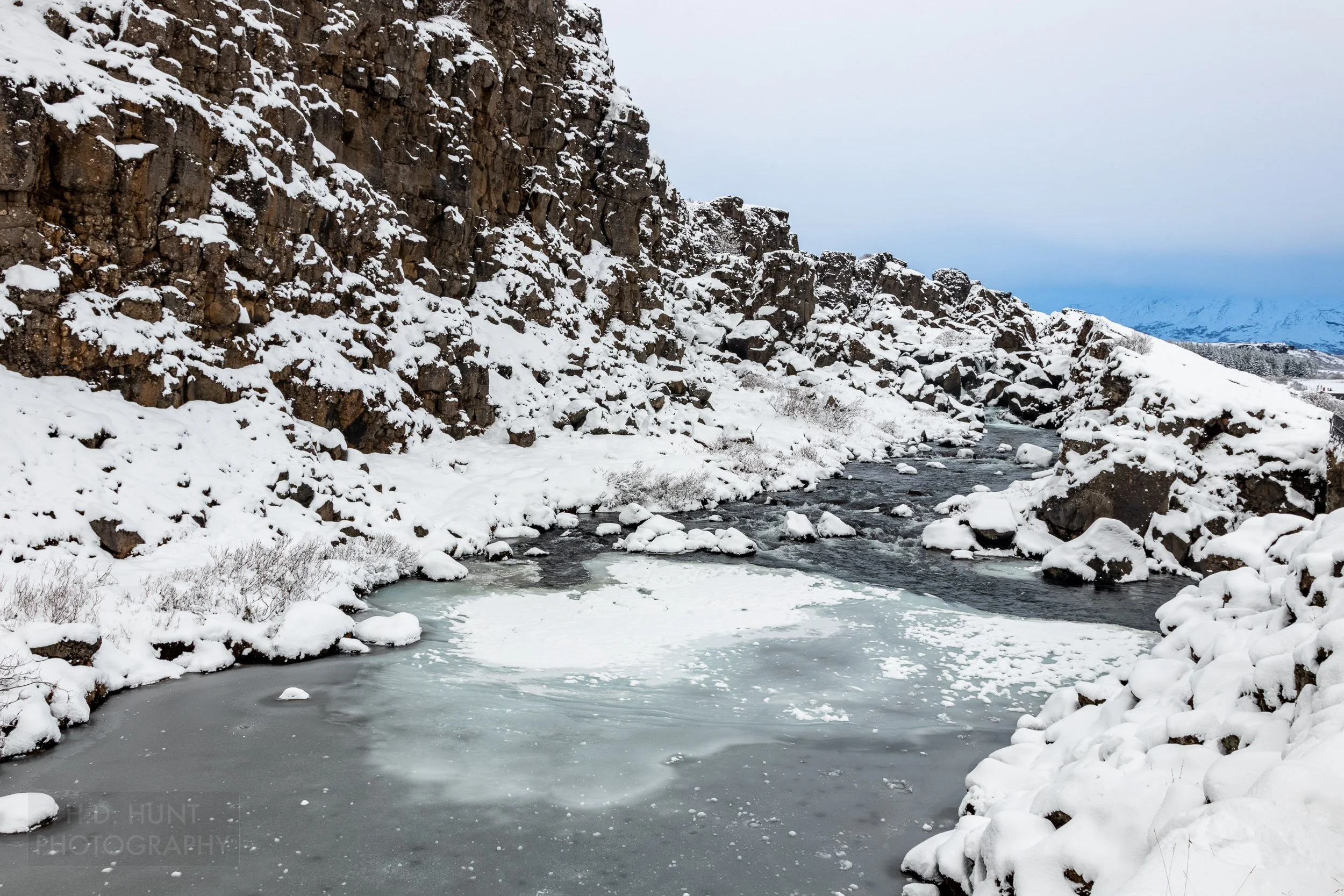 A pool of water called Drekkingarhylur is seen at Þingvellir, Iceland.
