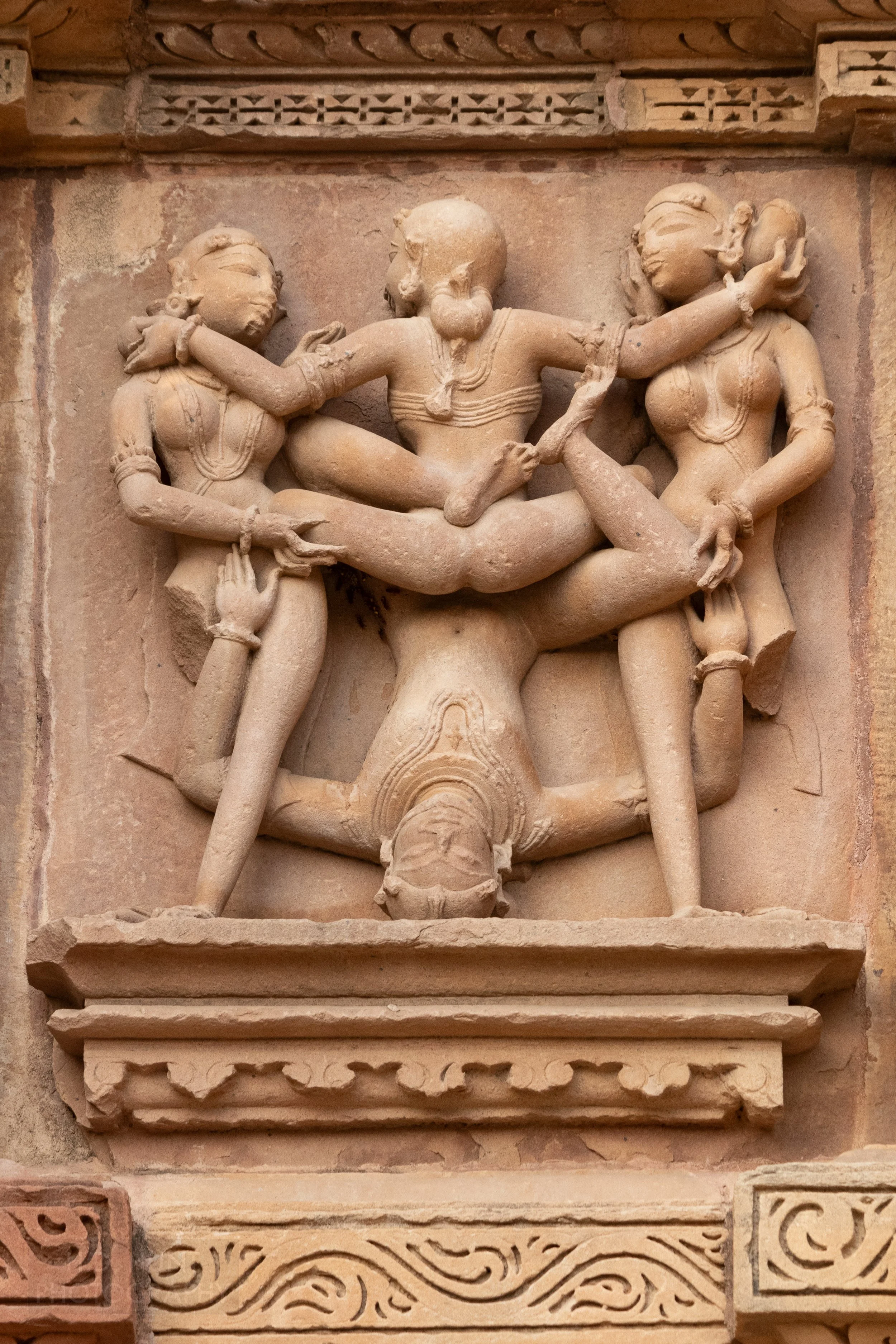 Close-up of the stone carvings adoring Kandariya Mahadeva, Khajuraho Group of Monuments, India.