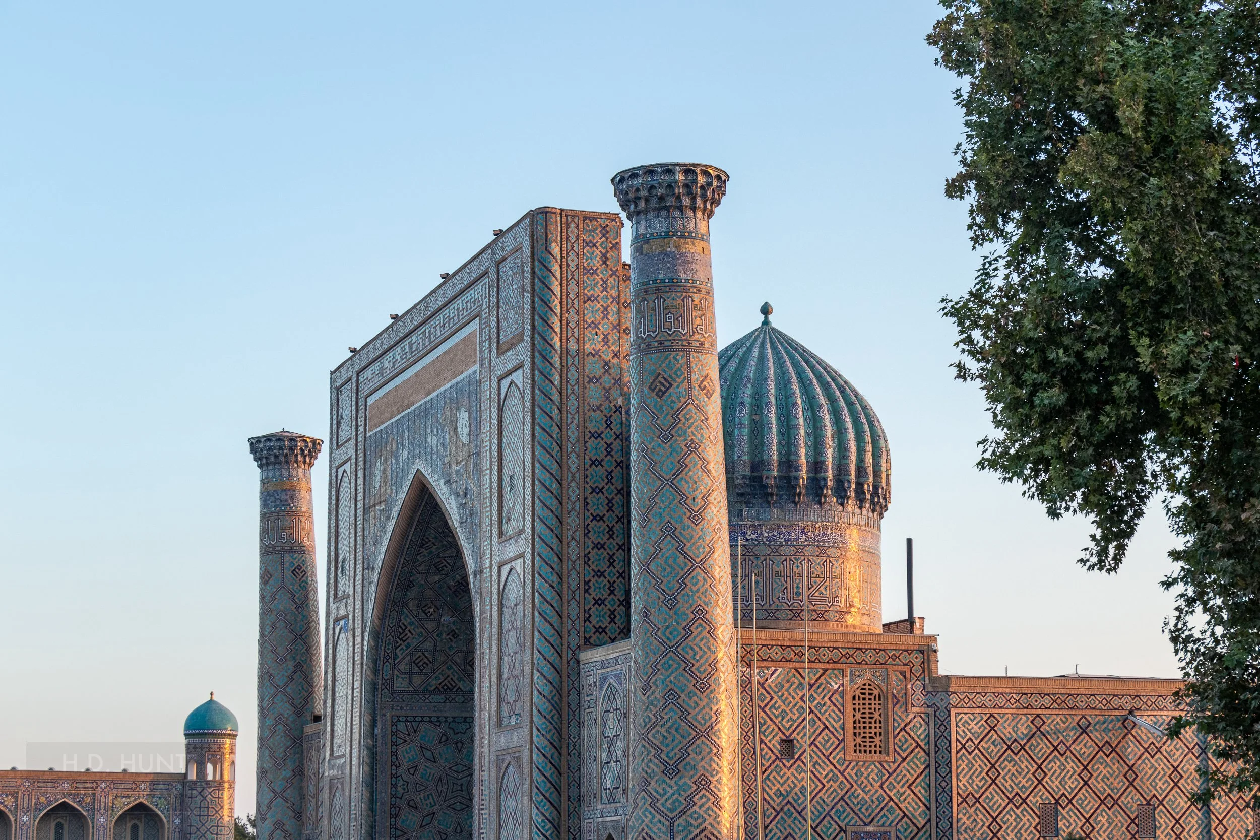 The Sher-Dor Madrasa at sunrise, Registan, Samarkand, Uzbekistan.