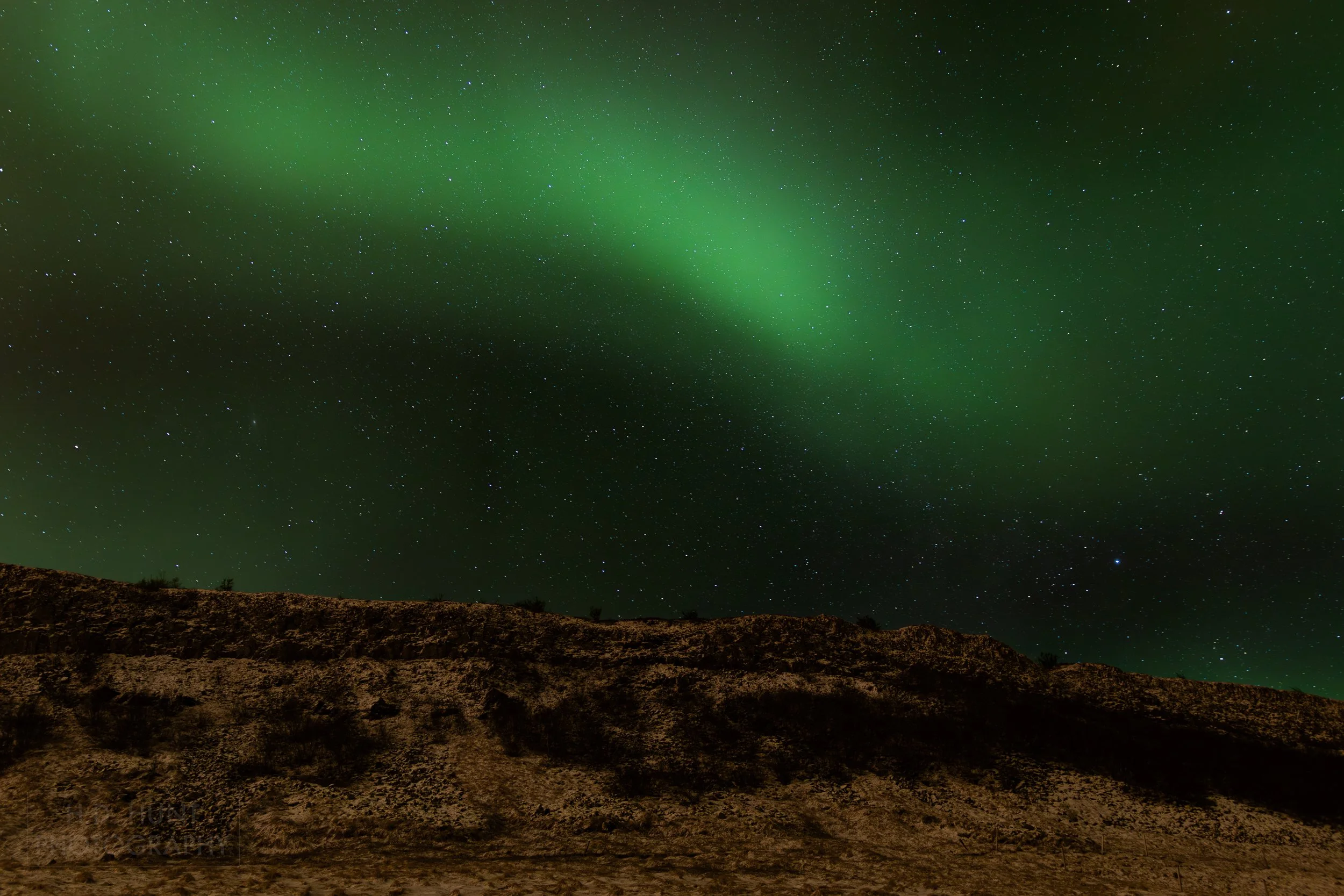 The green light of Aurora Borealis - the Northern Lights - is seen north of Reykholt í Biskupstungum, Iceland.