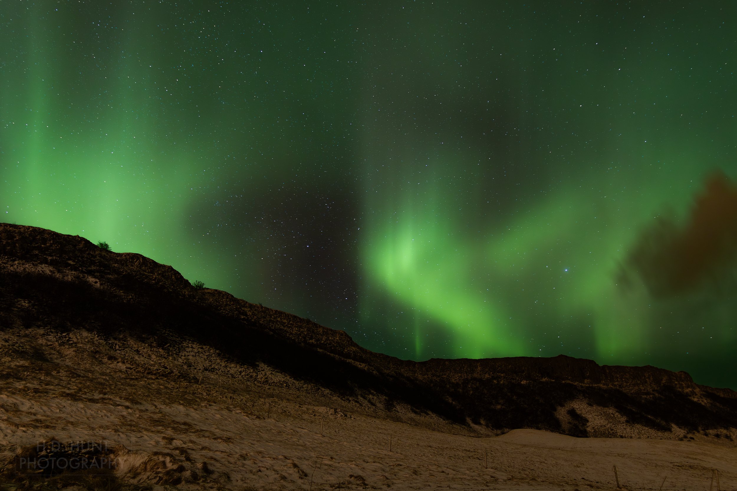 The green light of Aurora Borealis - the Northern Lights - is seen north of Reykholt í Biskupstungum, Iceland.
