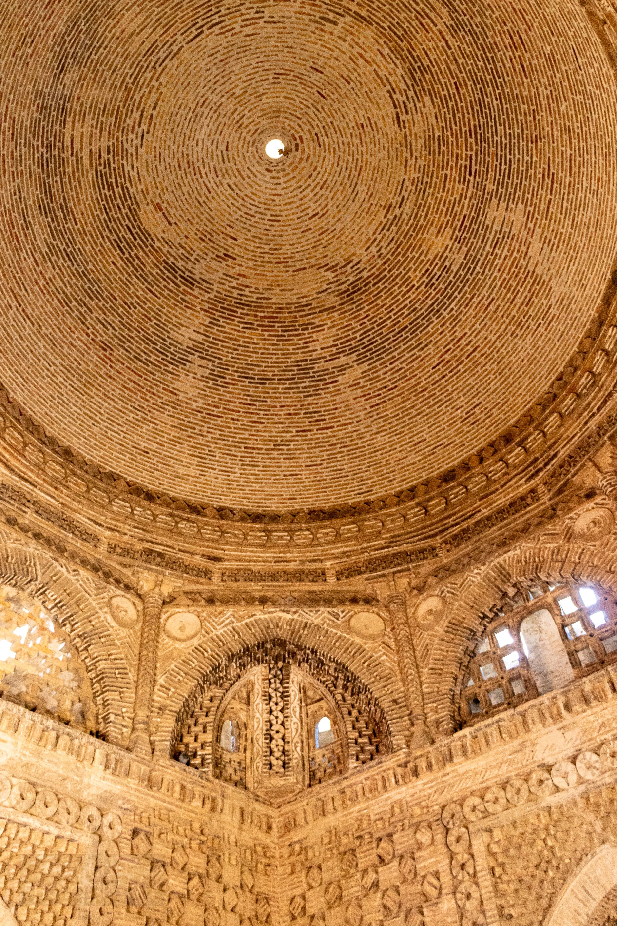 The large stone central dome of the Samanid Mausoleum in Bukhara, Uzbekistan.