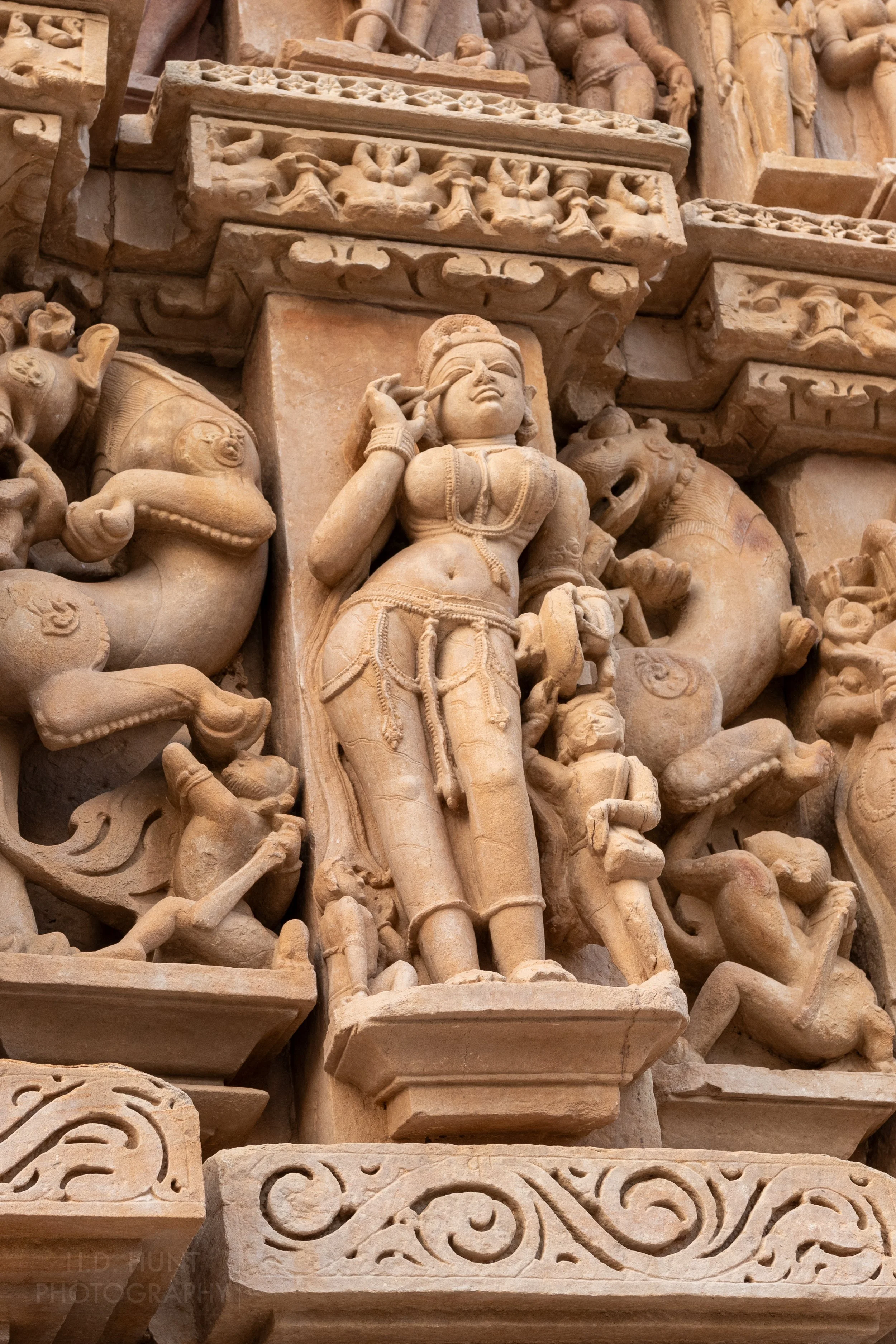 A close-up of the stone figures adorning Parshvanatha, Khajuraho, India.