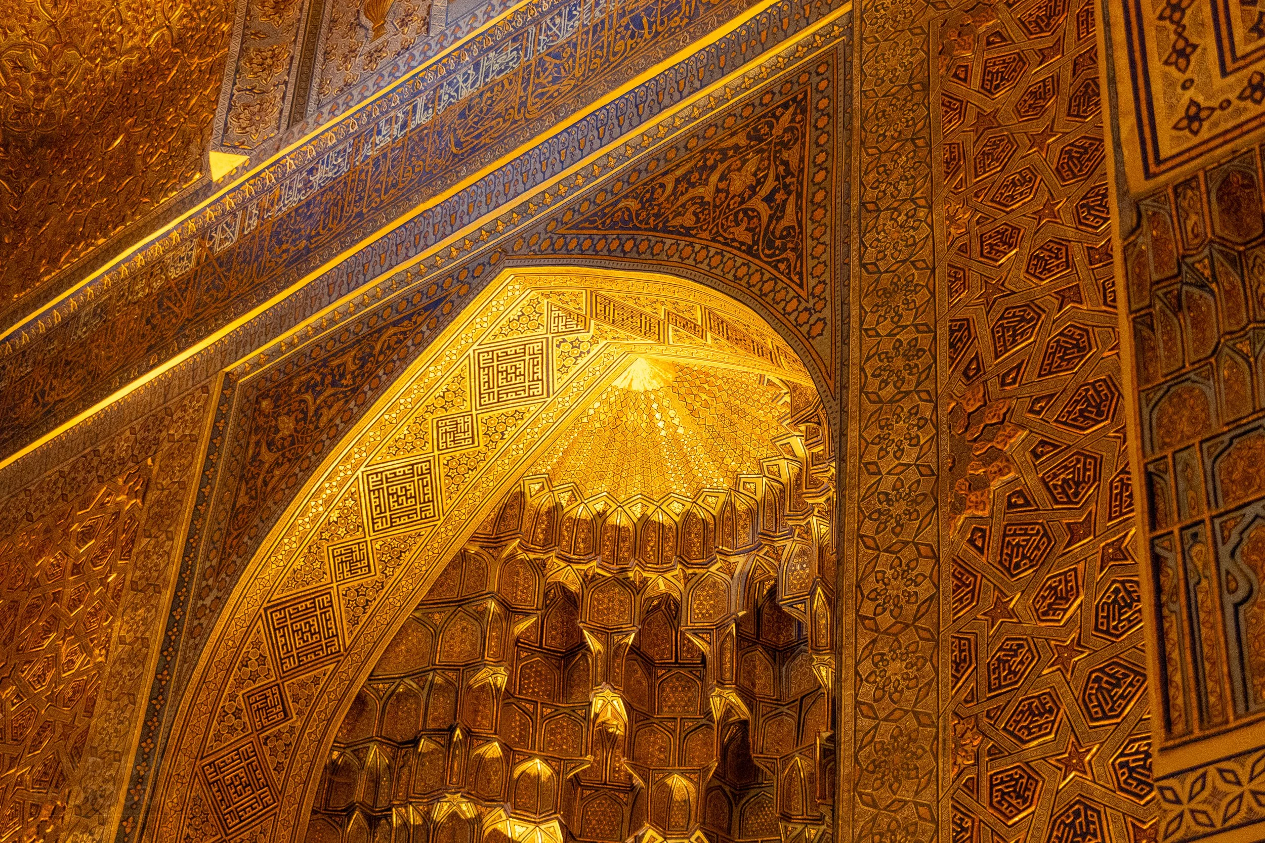 Golden interior of the Guri Amir mausoleum of Timur in Samarkand, Uzbekistan.