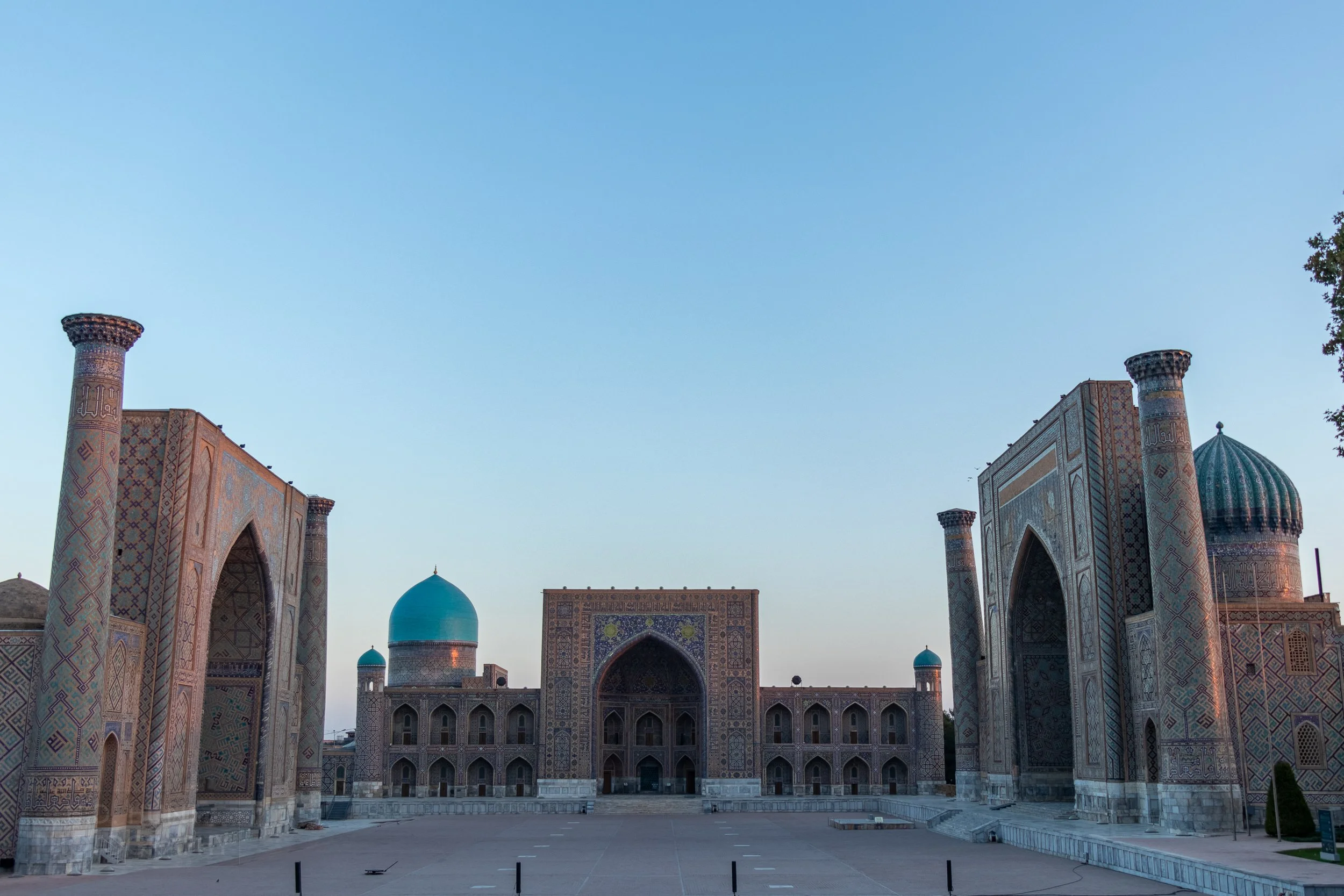 The Registan square illuminated near sunrise, Samarkand, Uzbekistan.