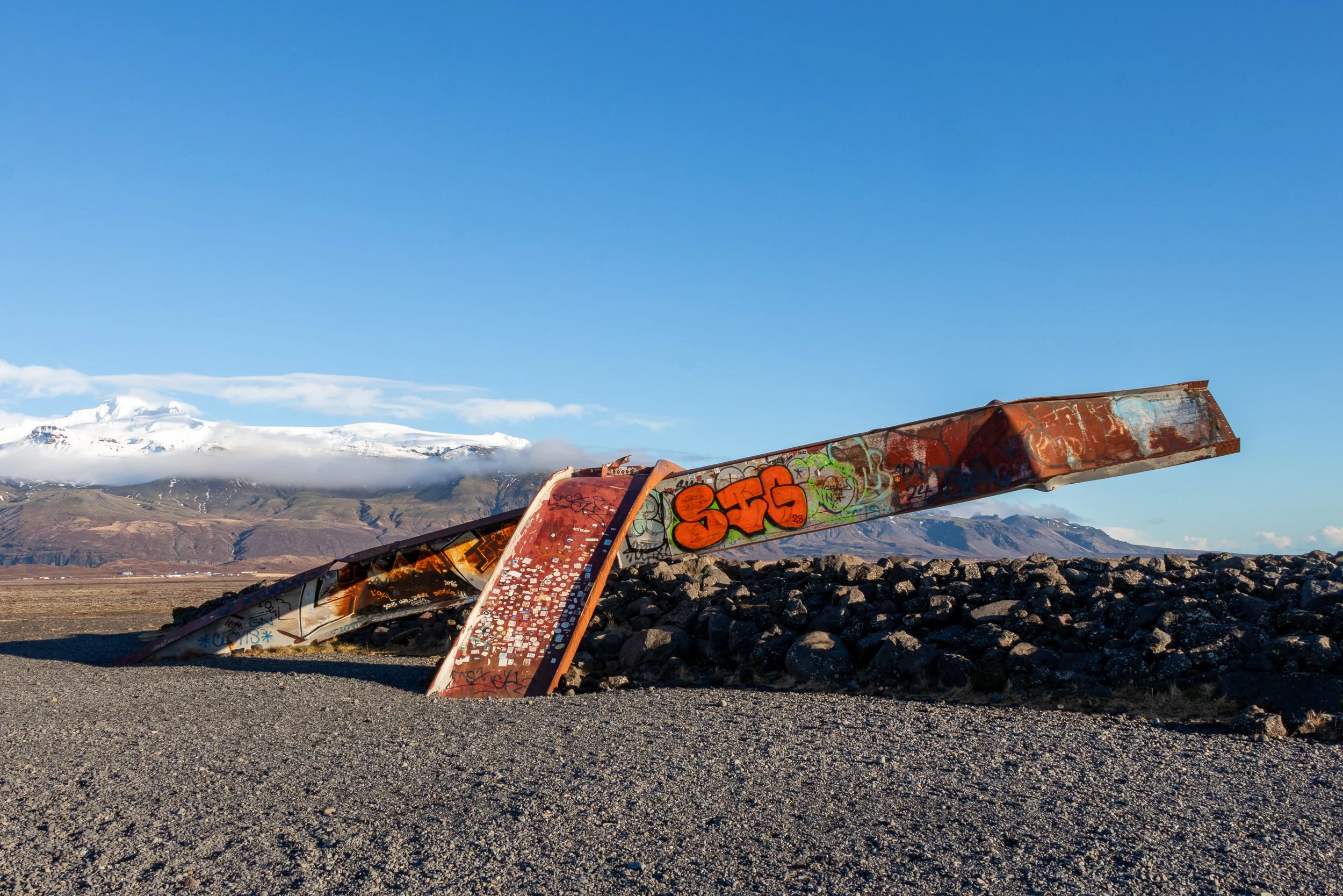 The graffitied rusted steel remains of the girder from the Skeiðará Bridge, Iceland.