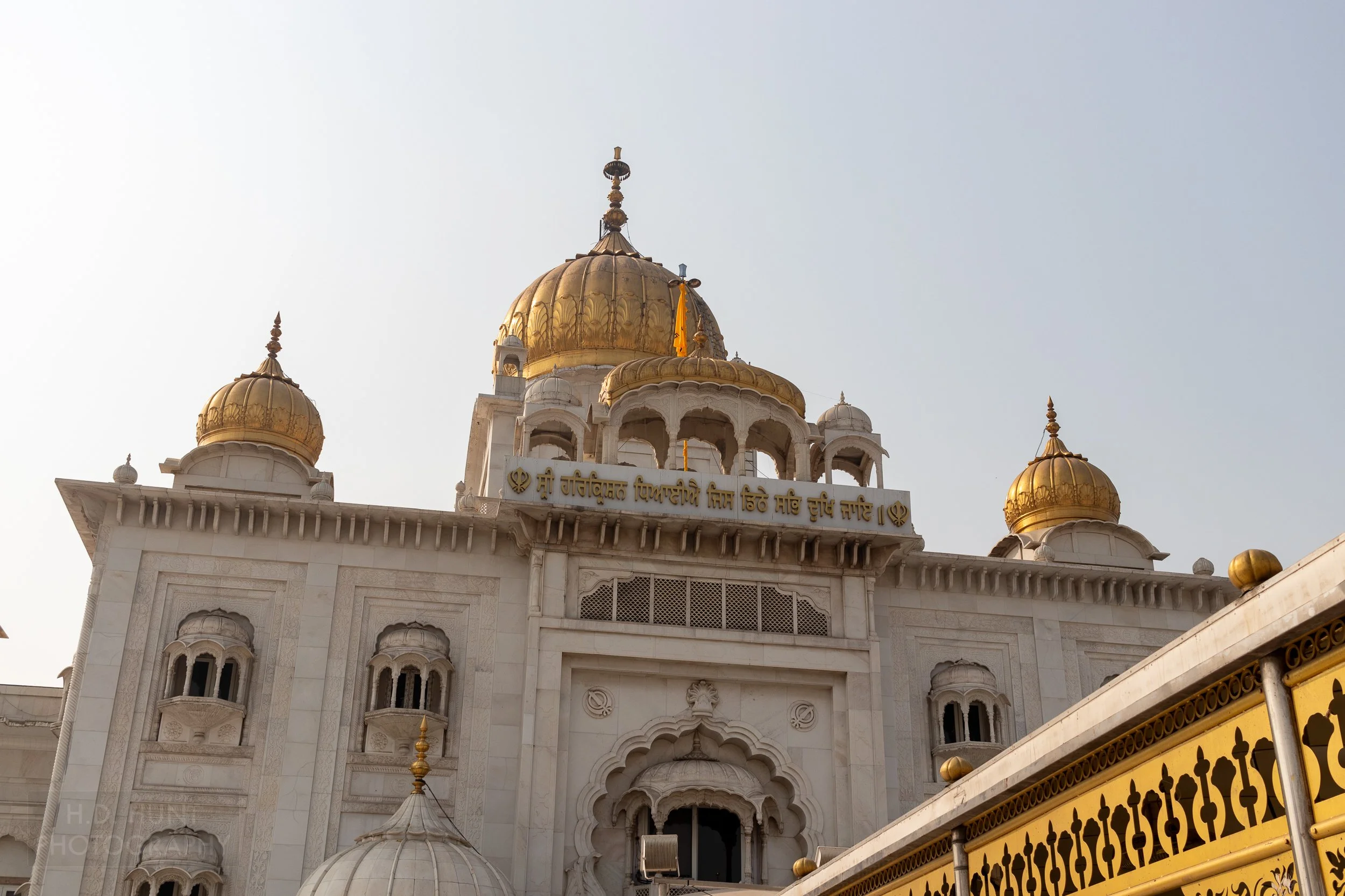The golden domed main temple of Gurdwara Bangla Sahib, Delhi, India.