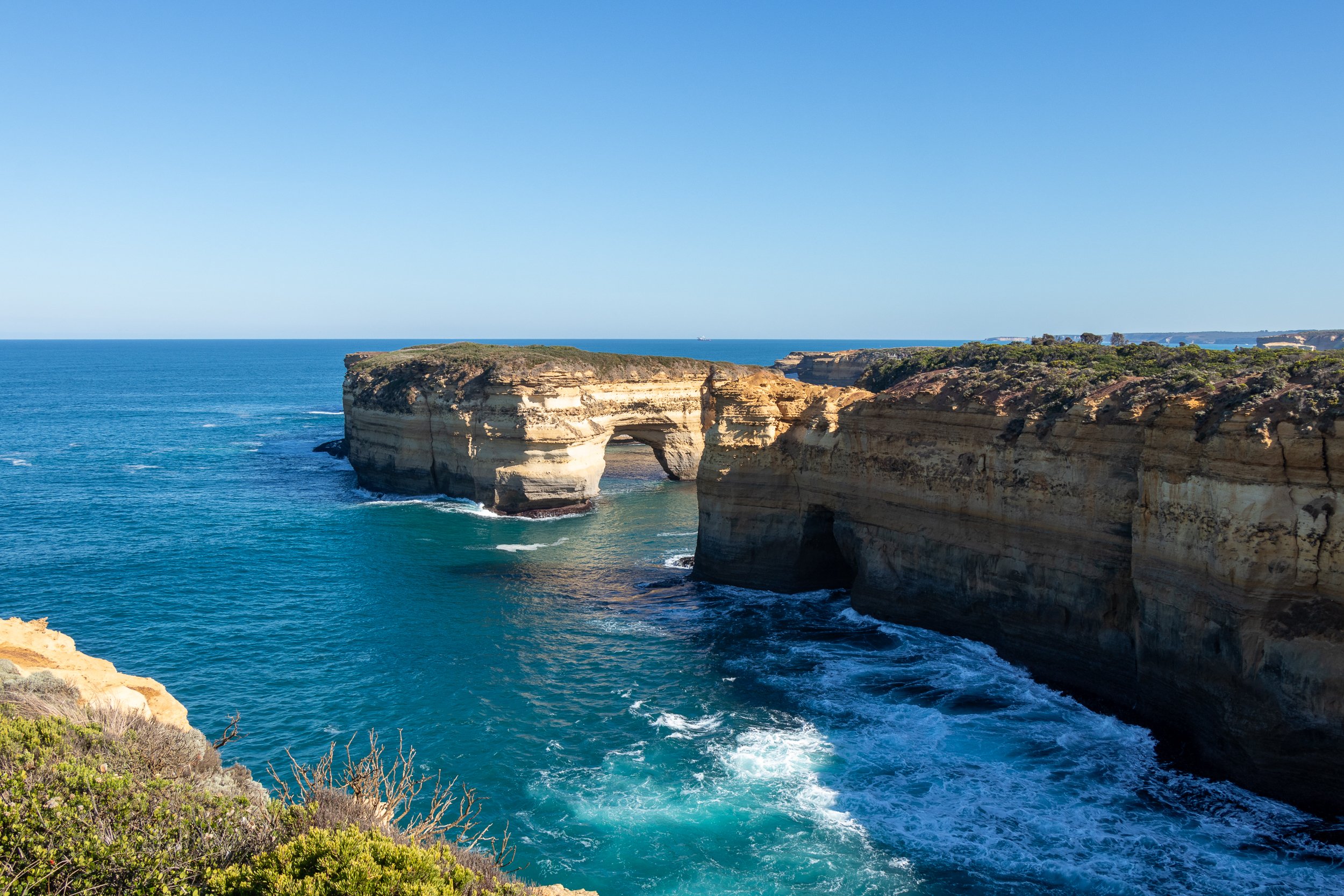 The arch beneath Mutton Bird Island is seen from the Island Arch Viewpoint at Loch Ard Gorge, Victoria, Australia.