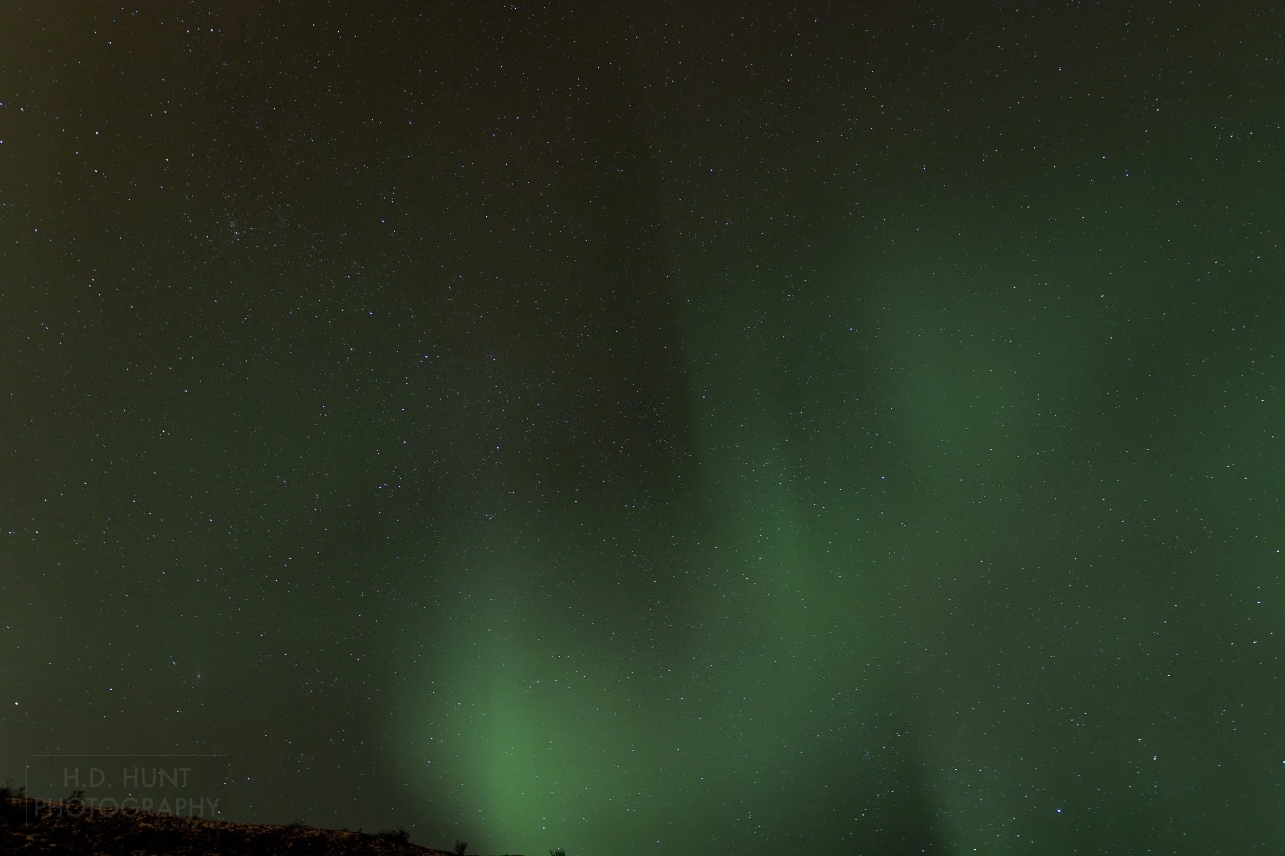 The green light of Aurora Borealis - the Northern Lights - is seen north of Reykholt í Biskupstungum, Iceland.
