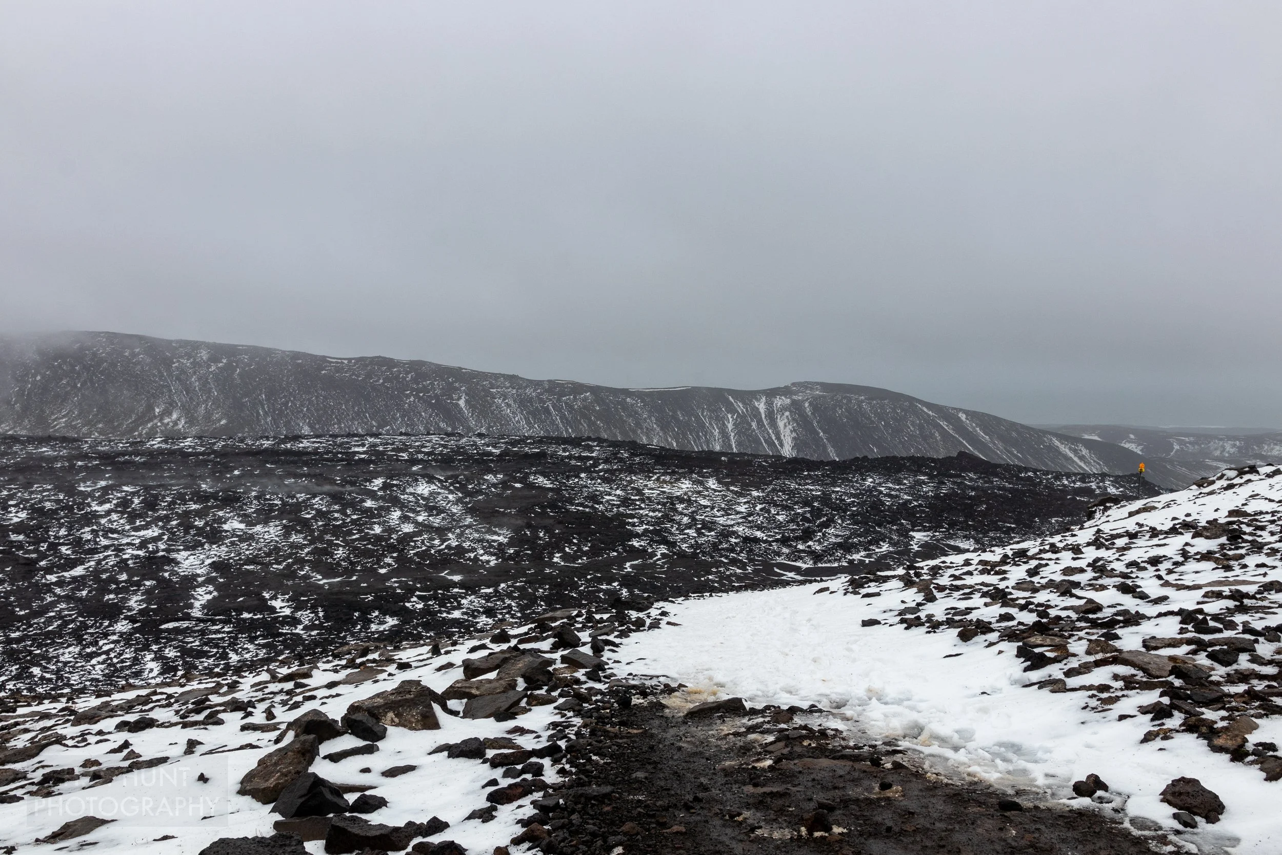A large, recent but now-solid lava flow is seen in a valley on Reykjanes Peninsula, Iceland.