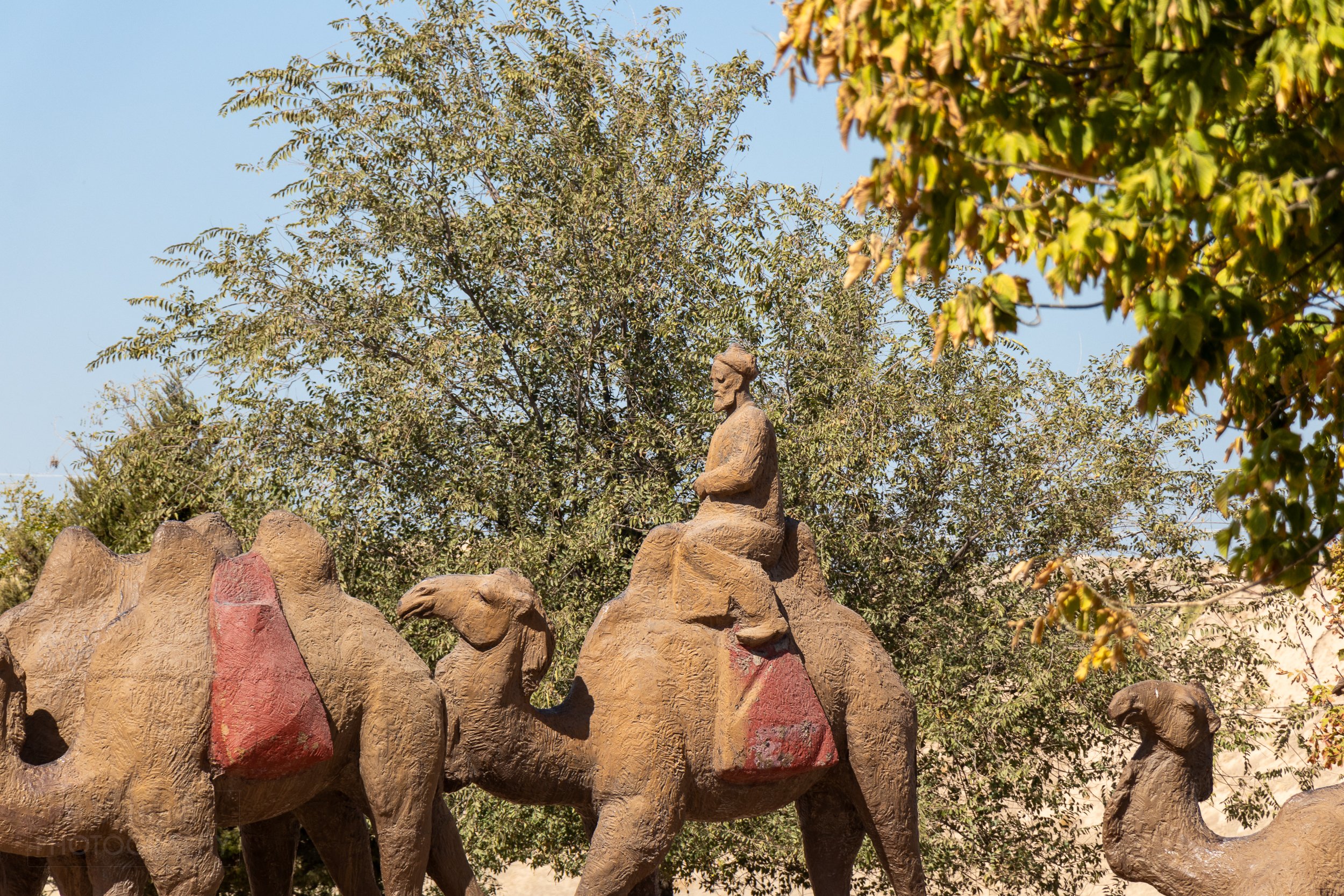 Three camels statues stand outside the Afrasiab Museum of Samarkand, Uzbekistan.