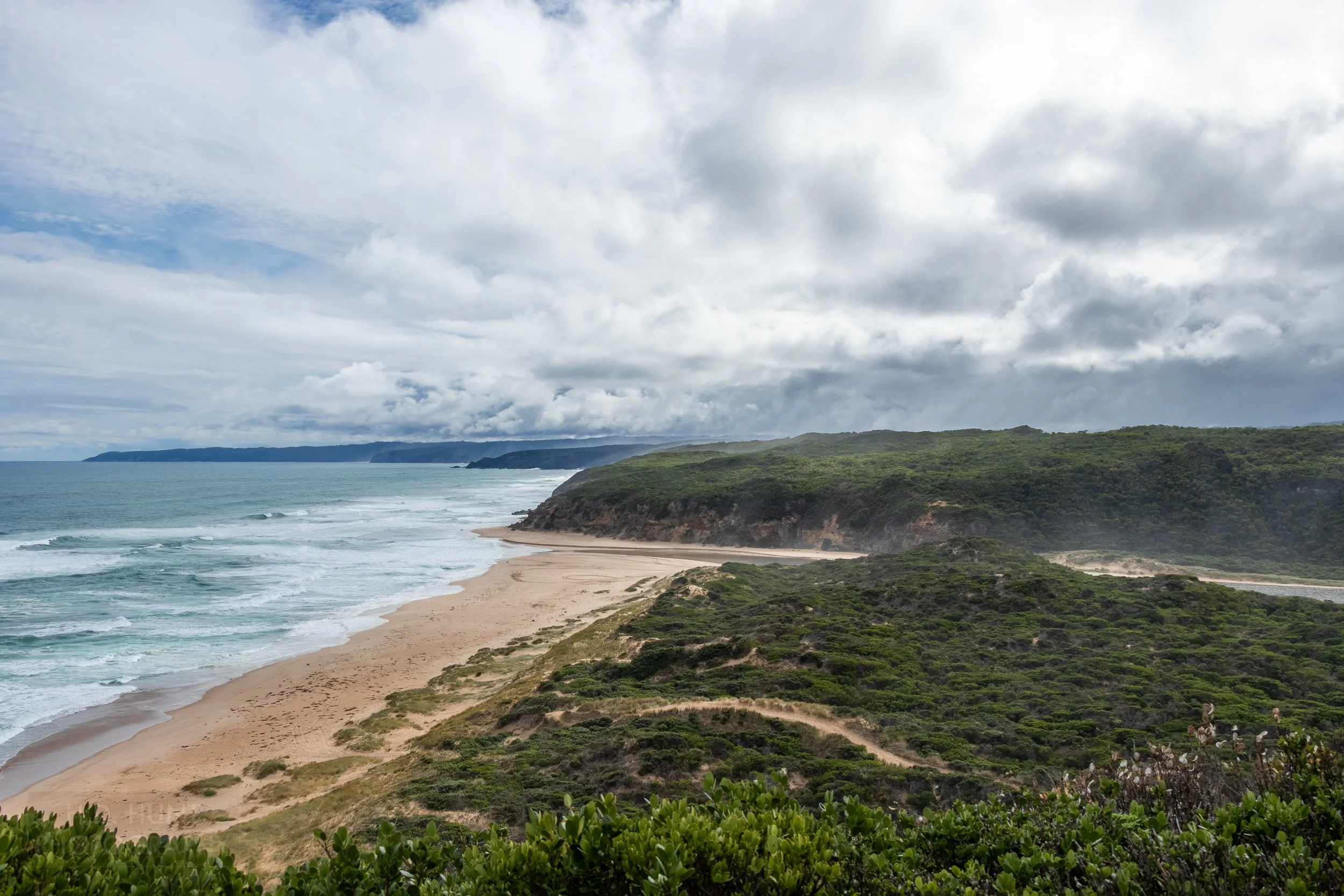The Aire River runs into the Southern Ocean near The Great Ocean Walk, Victoria, Australia.