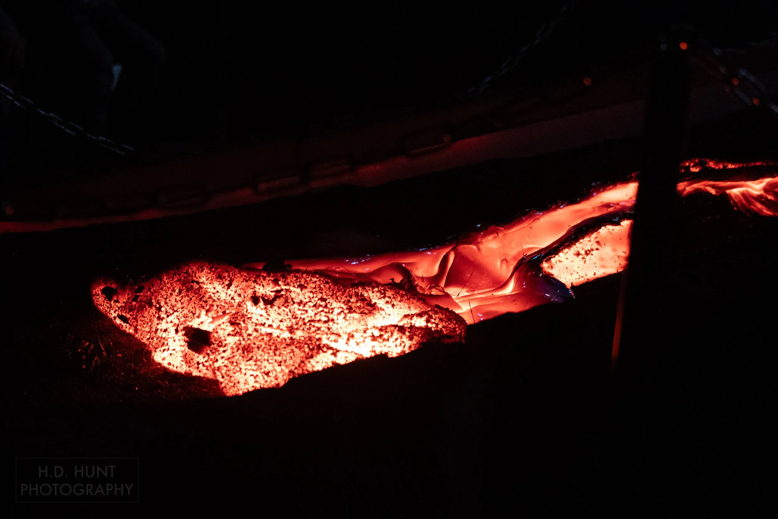 Lava cools turning from bright orange to black at the Lava Show, Vik i Myrdal, Iceland.