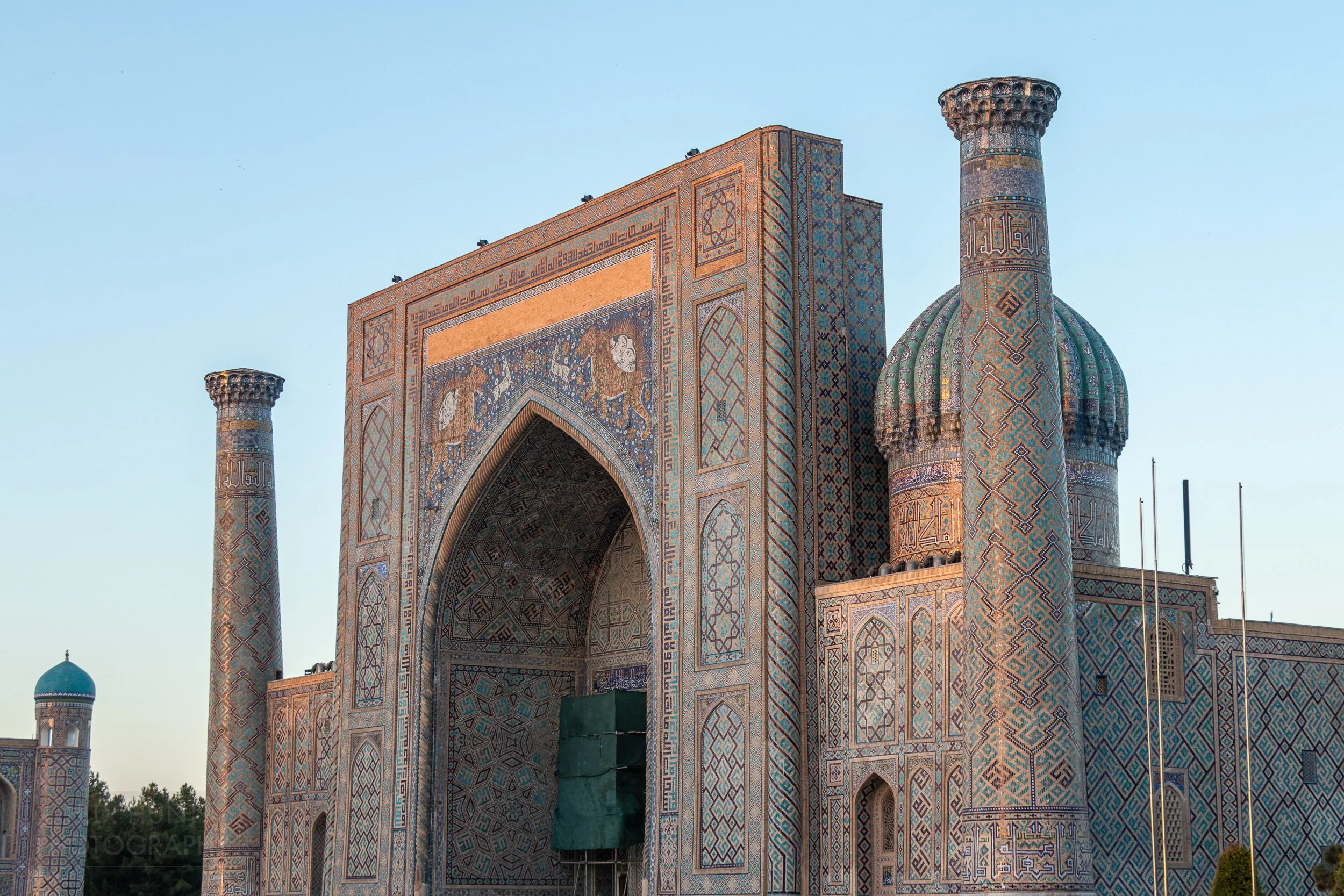 The Sher-Dor Madrasa at sunrise, Registan, Samarkand, Uzbekistan.