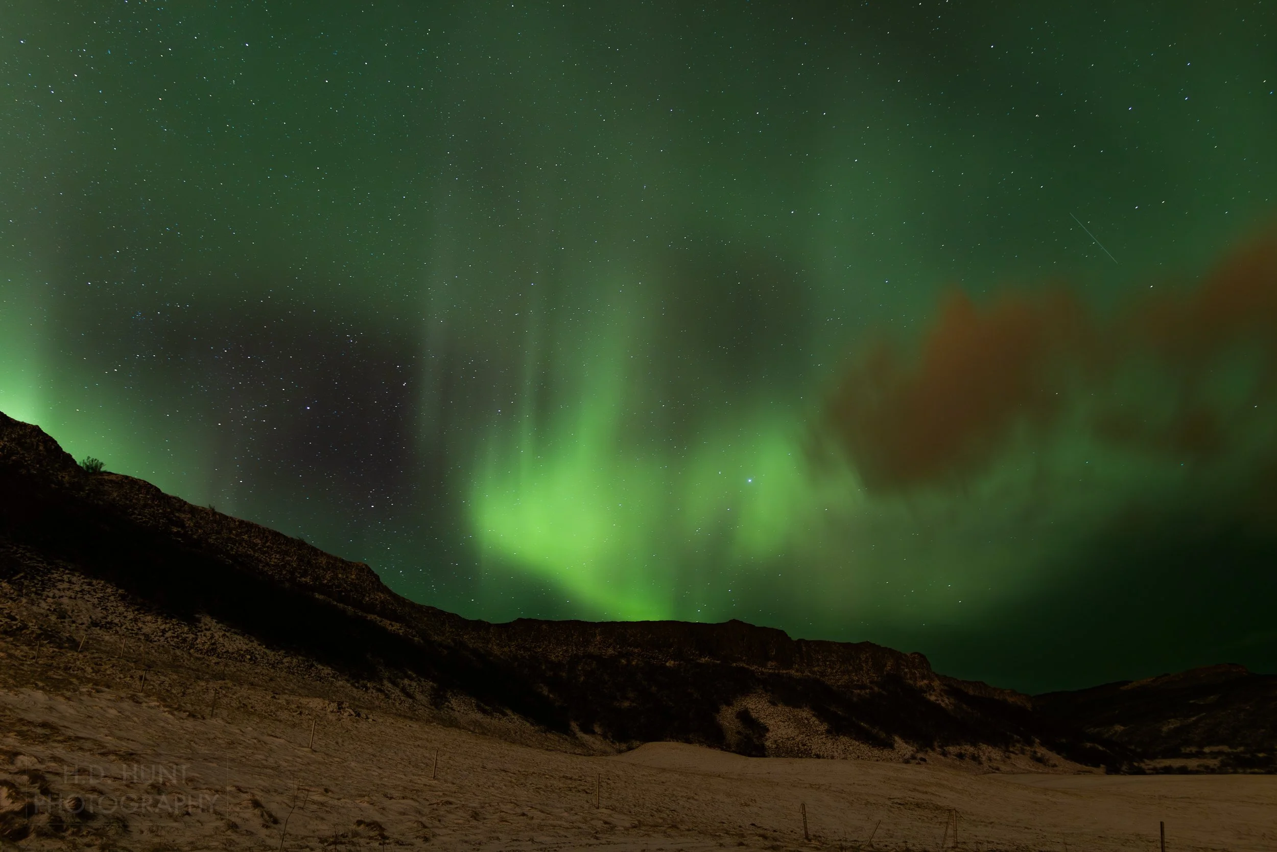 The green light of Aurora Borealis - the Northern Lights - is seen north of Reykholt í Biskupstungum, Iceland.