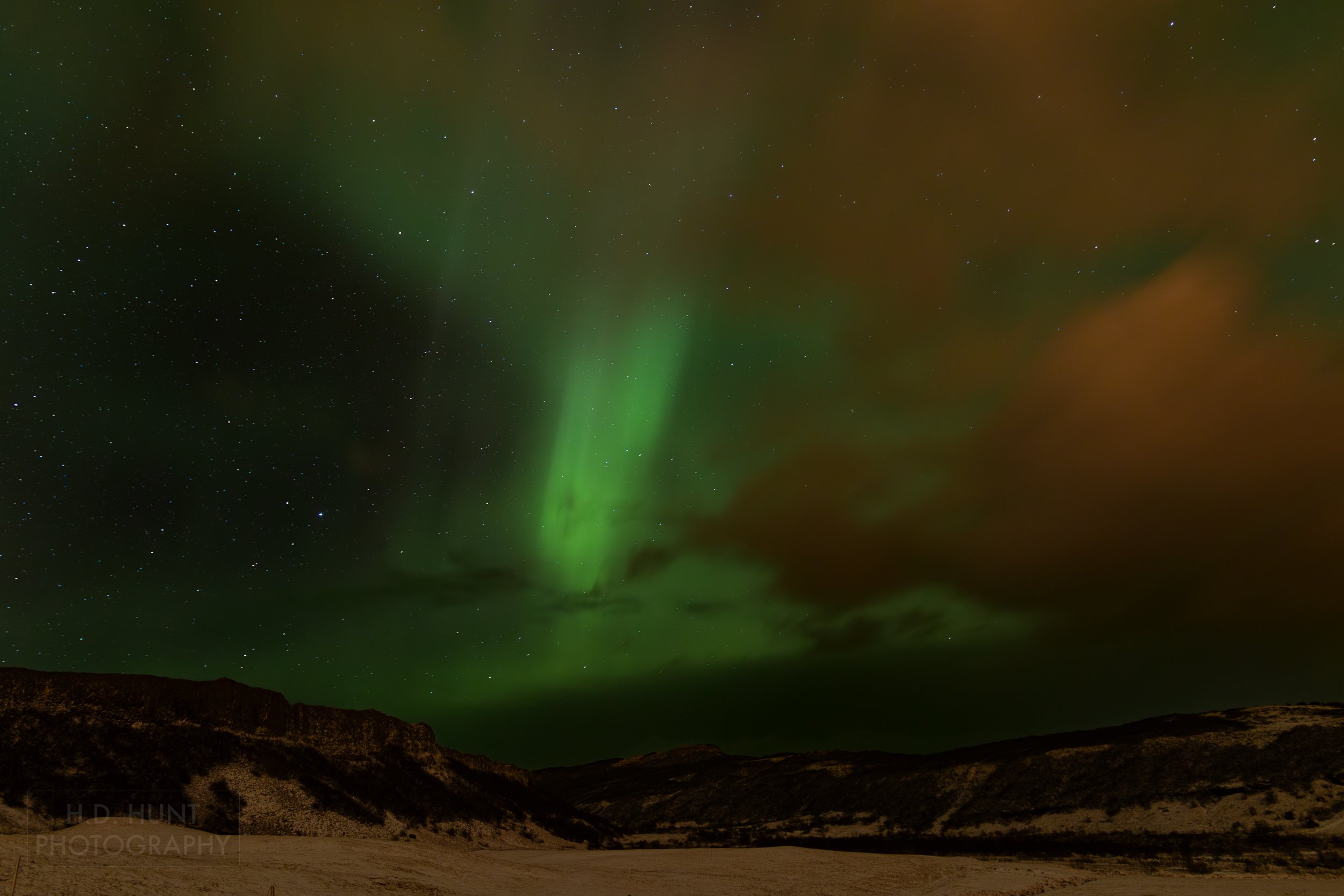 The green light of Aurora Borealis - the Northern Lights - is seen north of Reykholt í Biskupstungum, Iceland.