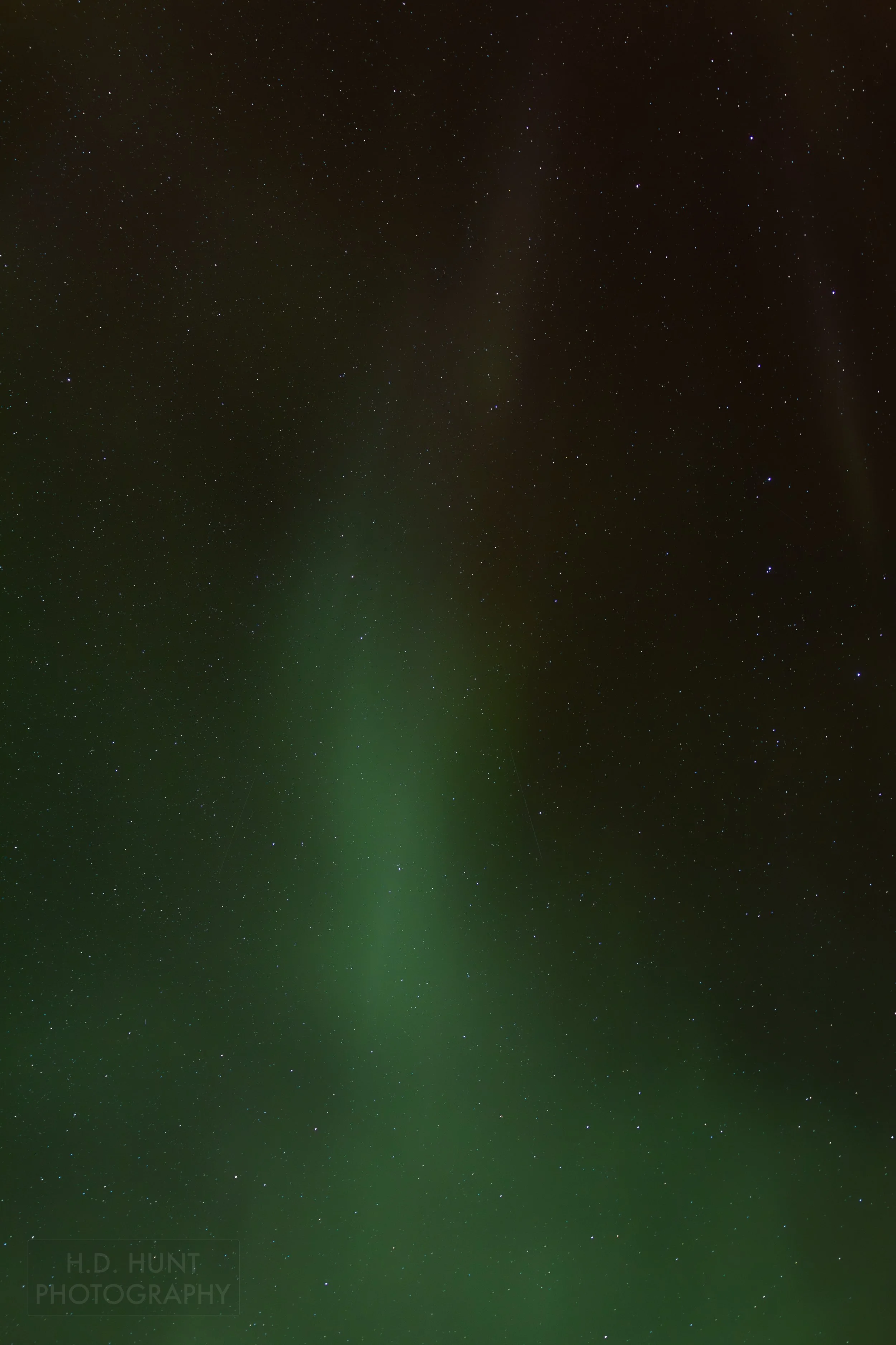 The green light of Aurora Borealis - the Northern Lights - is seen north of Reykholt í Biskupstungum, Iceland.