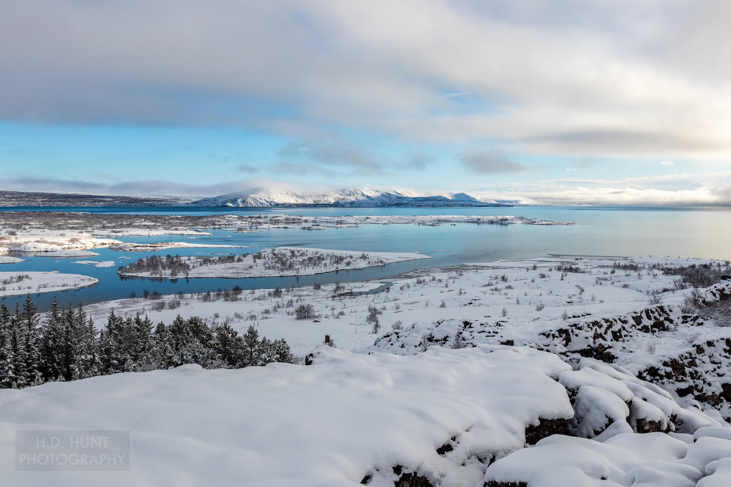 Þingvallavatn lake and mountains are seen in the distance from Þingvellir, Iceland.