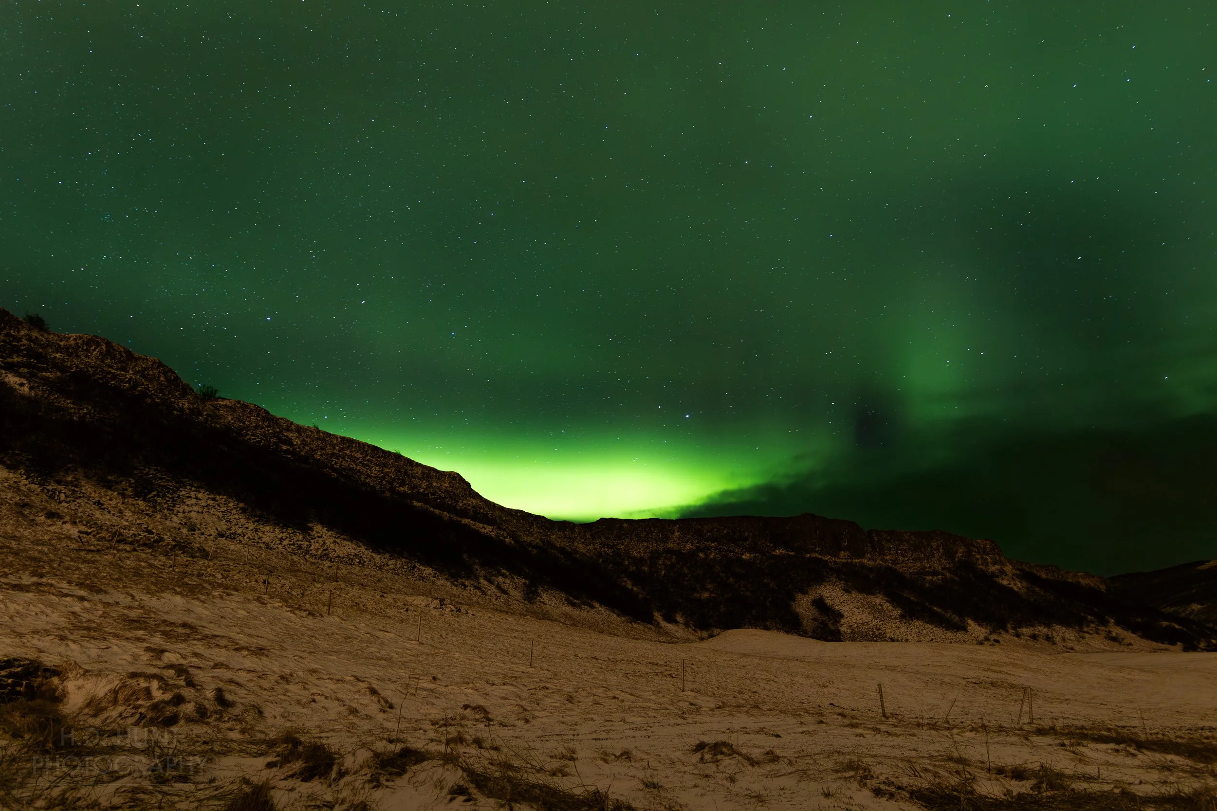 The green light of Aurora Borealis - the Northern Lights - is seen north of Reykholt í Biskupstungum, Iceland.