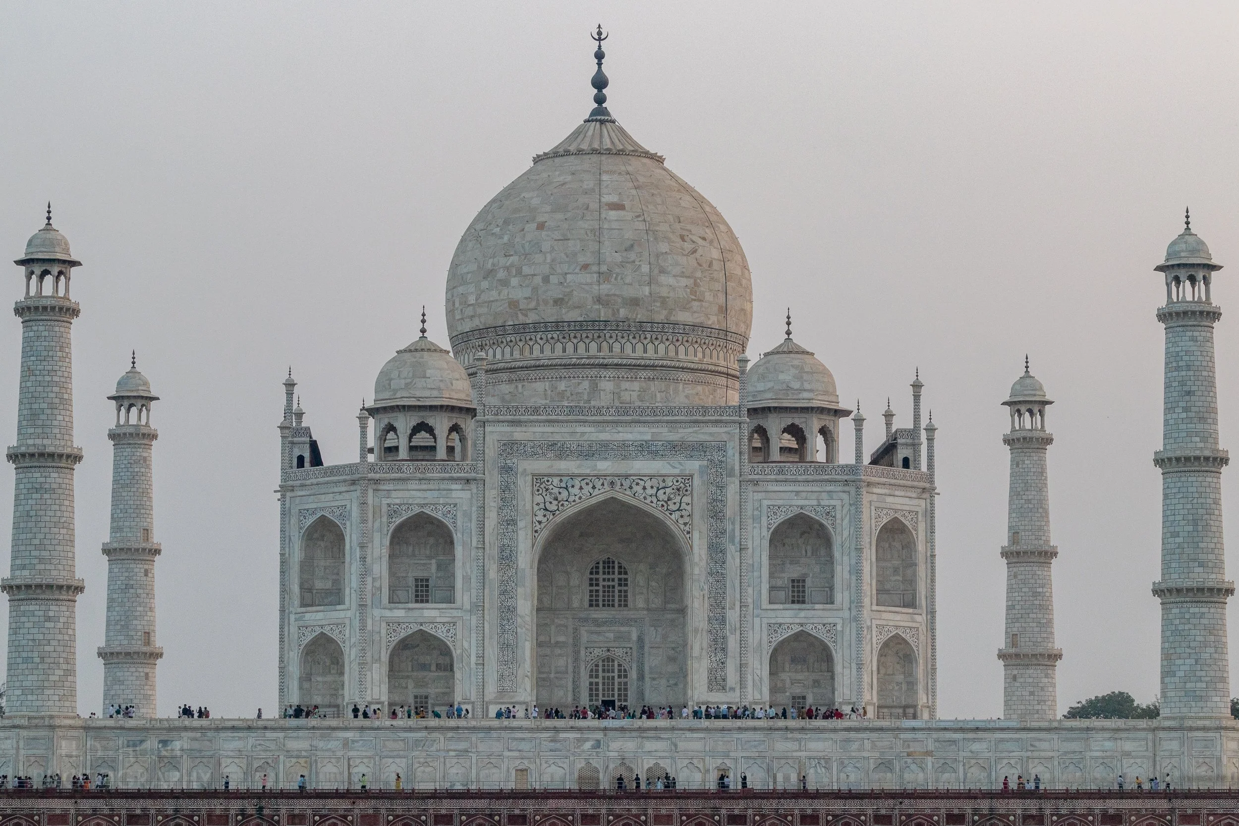The main buildings of the Taj Mahal are seen from across the Yamuna River, Agra, India.
