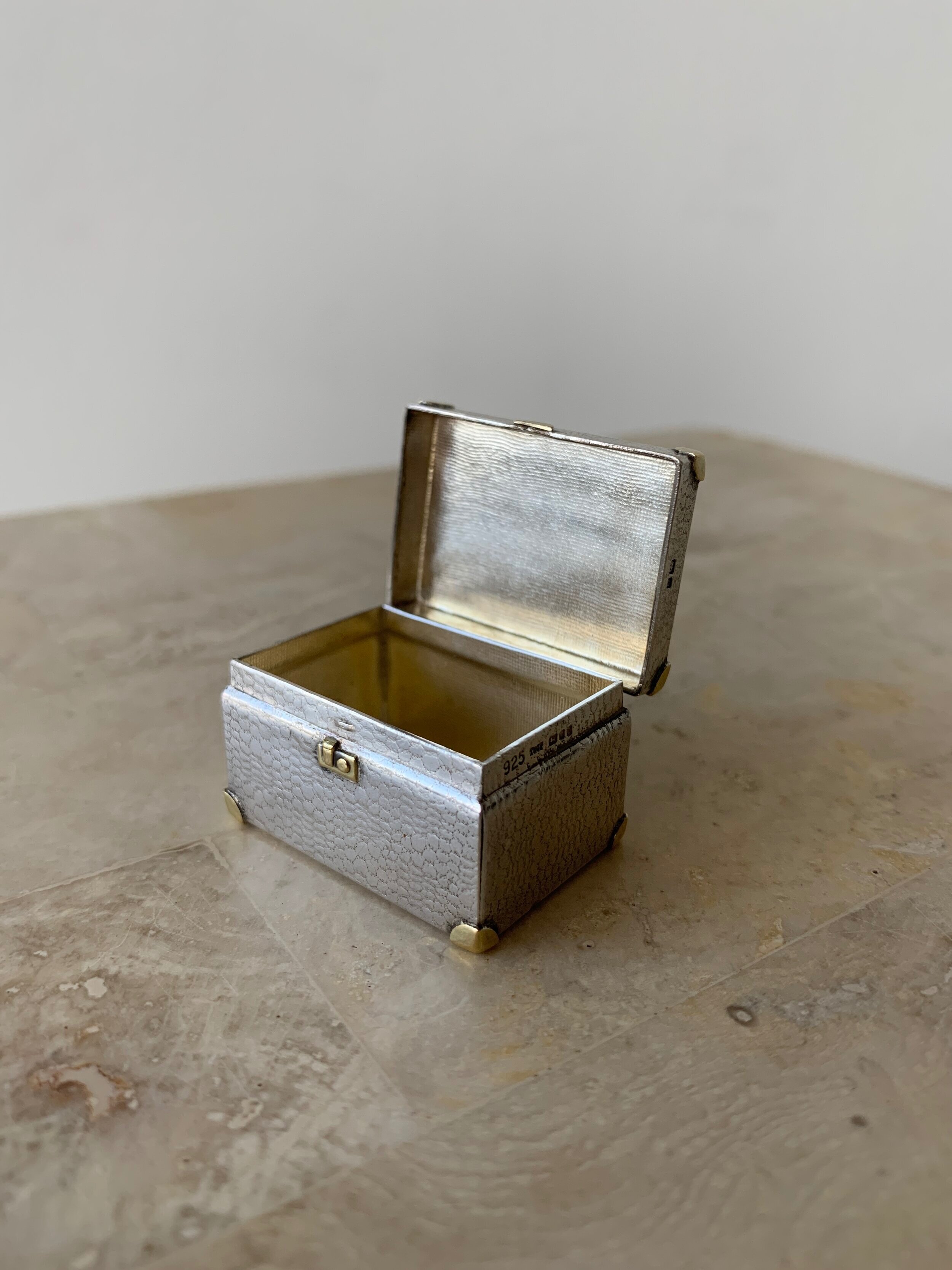 Sold at Auction: Silver Monogram Metal Mini Treasure Trunk, 2022