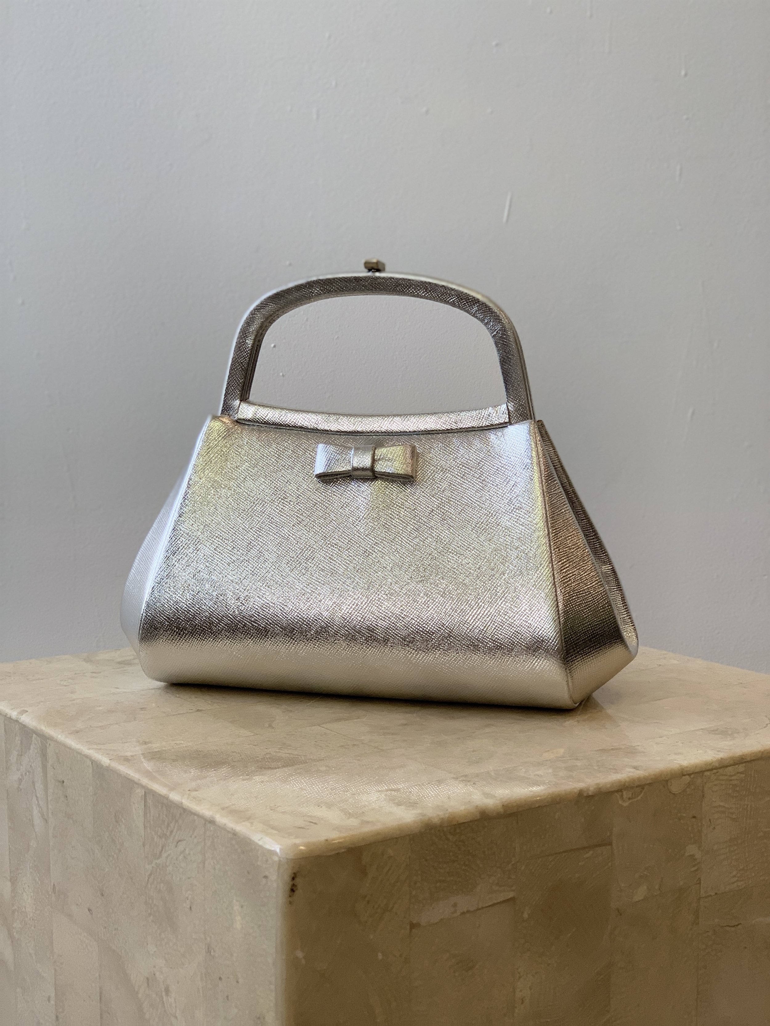 Vintage Silver Saffiano Leather Handbag with Bow Detail by Bienen-Davis,  Circa 1950s-60s — portmanteau new york