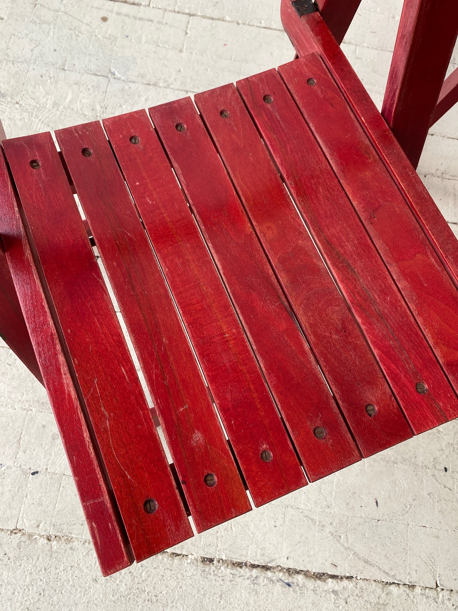 Vintage Red Aniline-Dyed Trieste Slatted Folding Chairs Vintage Red Aniline-Dyed Trieste Slatted Folding Chairs