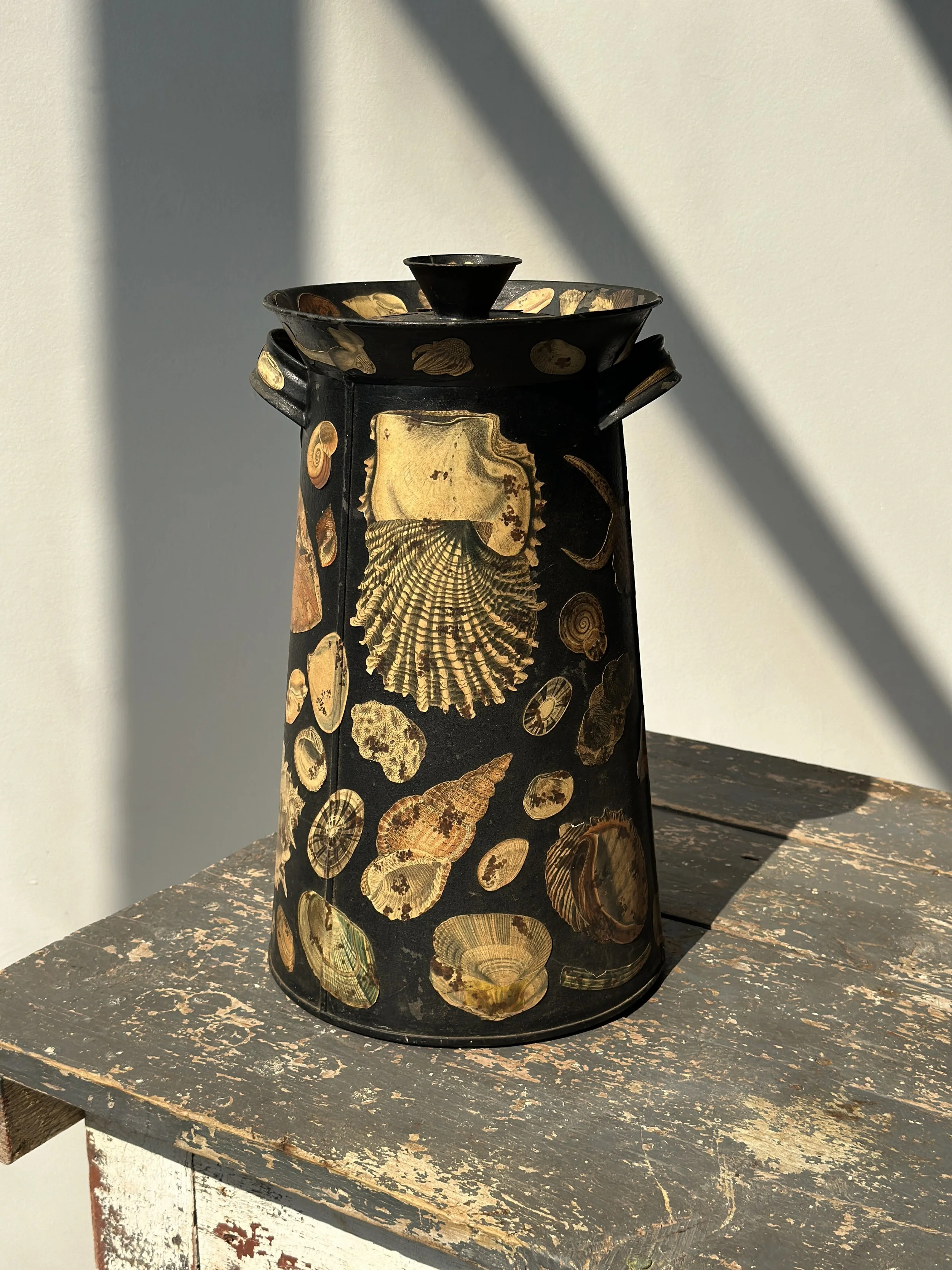 Antique Large-Scale Black Painted Tin Canister with Shell Illustration Decoupage, Circa Late 19th - Early 20th Century