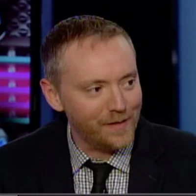 I really ought to get a professional headshot, but for now screengrabs from TV appearances will have to suffice.