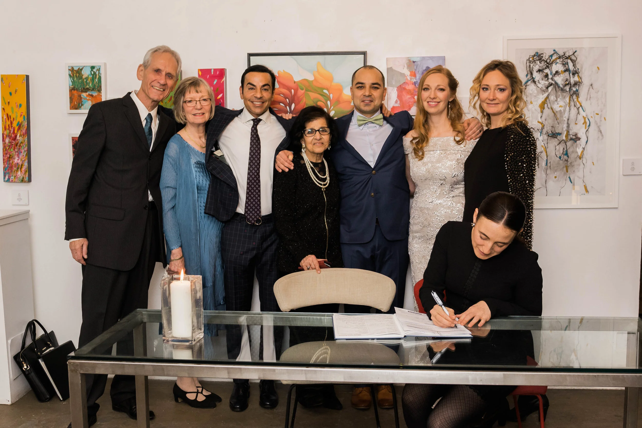 Omar and Christina signing.jpg
