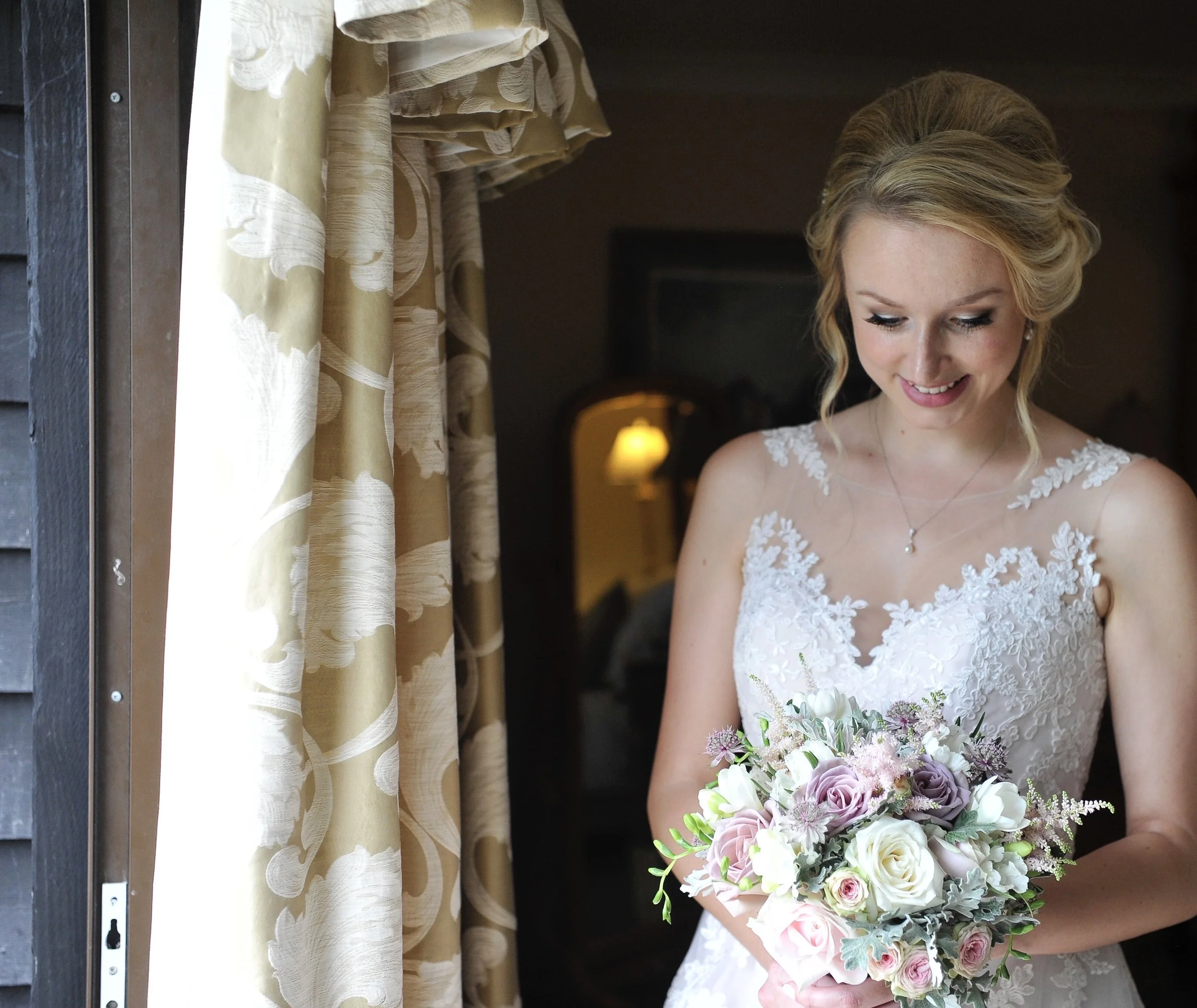Bride with bridal bouquet. Wedding in Hasting, East Sussex. Wedding flowers and florists in Sussex.