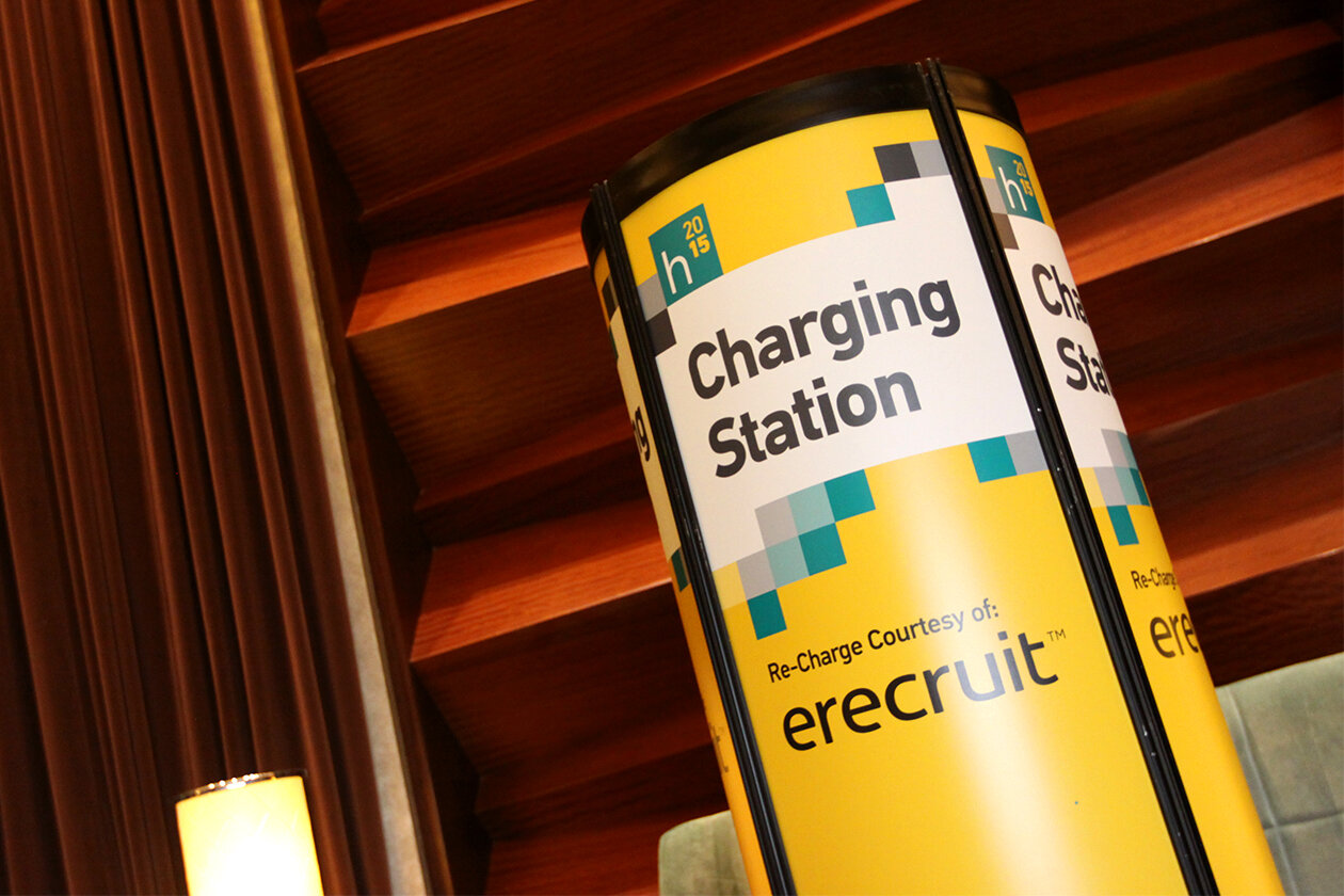   CHARGING STATION:  Placed in front of the conference registration booth to recharge while networking 