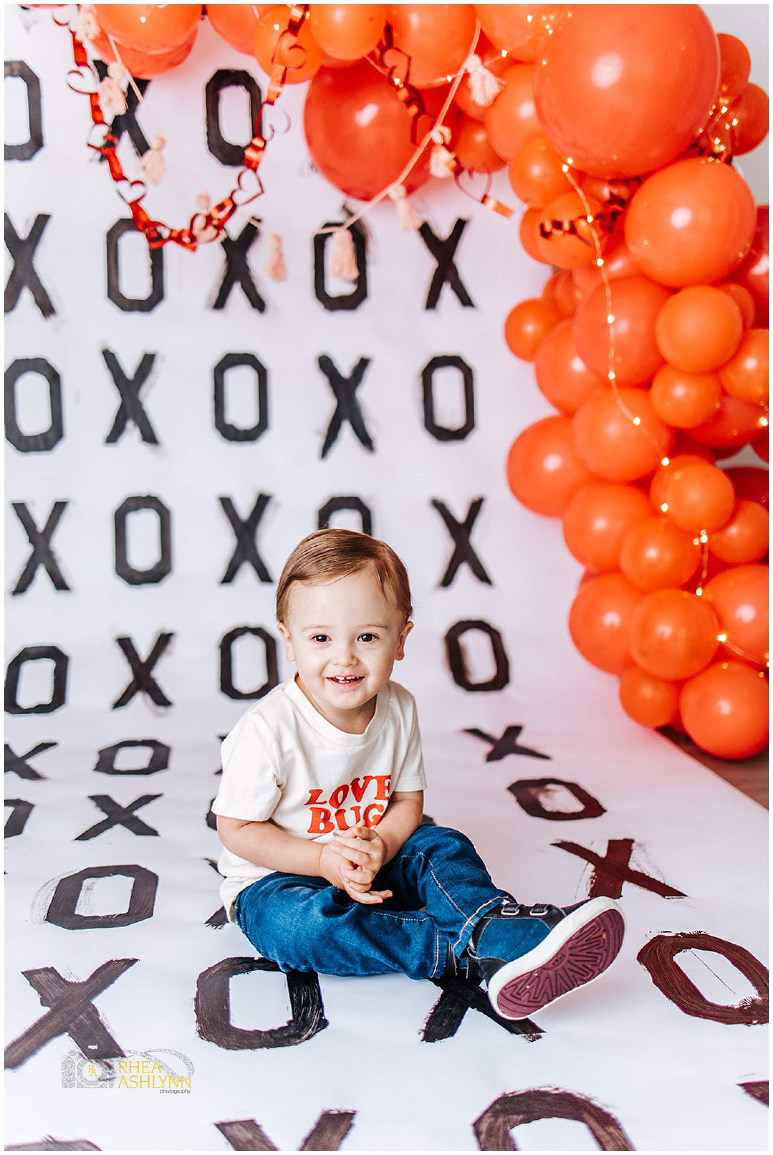 boy smiling for valentine's day photos
