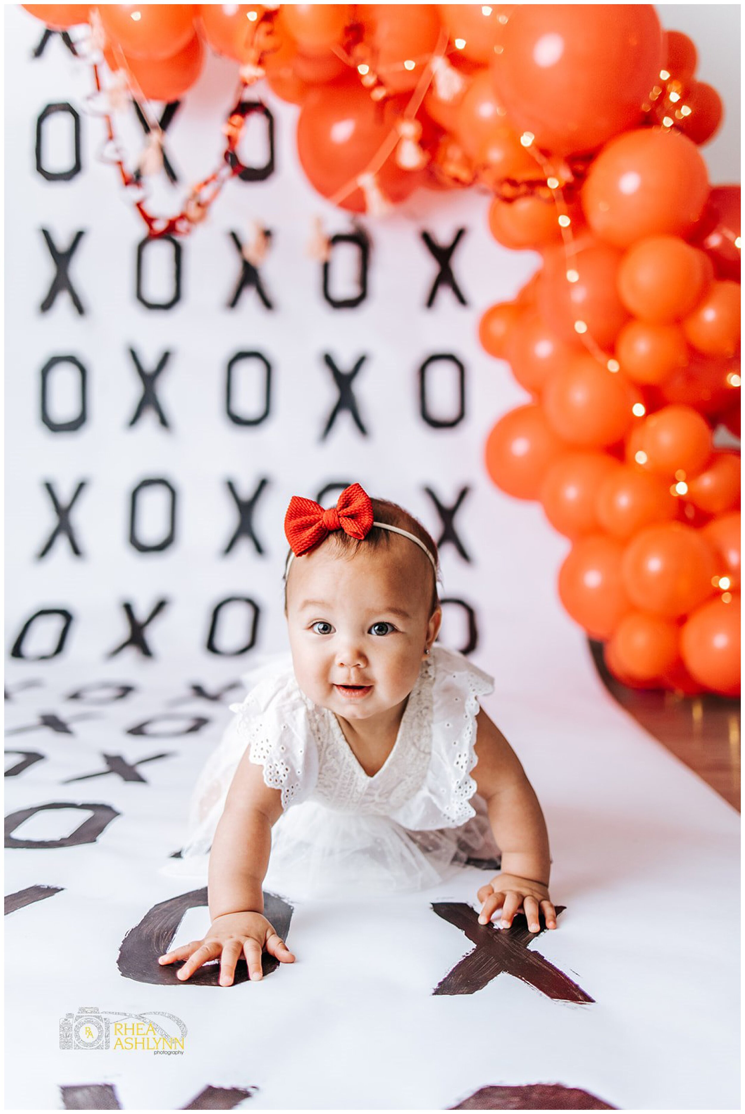 toddler crawling on xoxo wallpaper