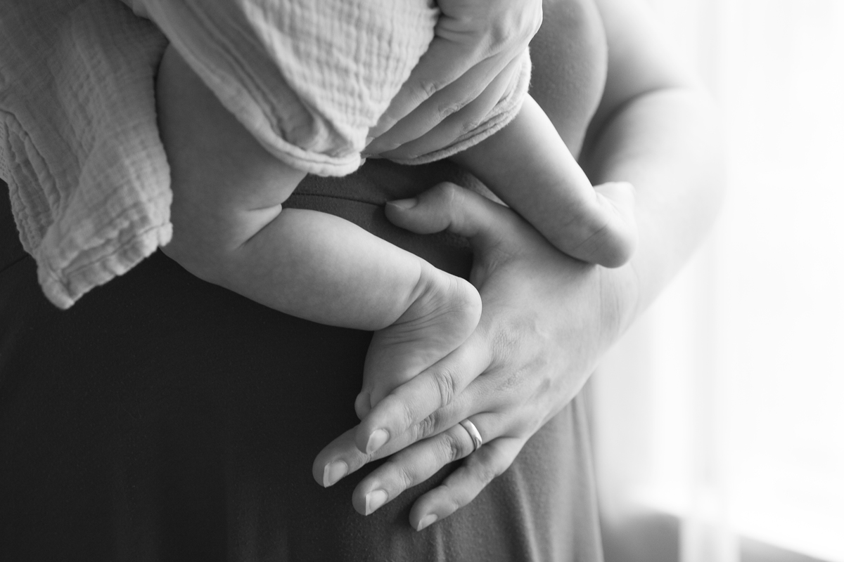 lifestyle-newborn-photo-mother-holding-baby.jpg