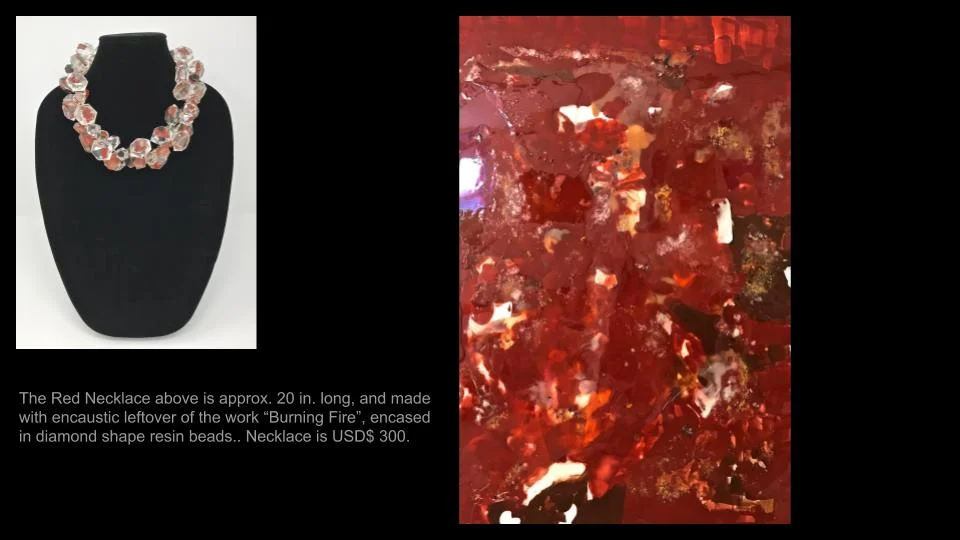 Red diamond-shaped necklace and "Burning Fire"