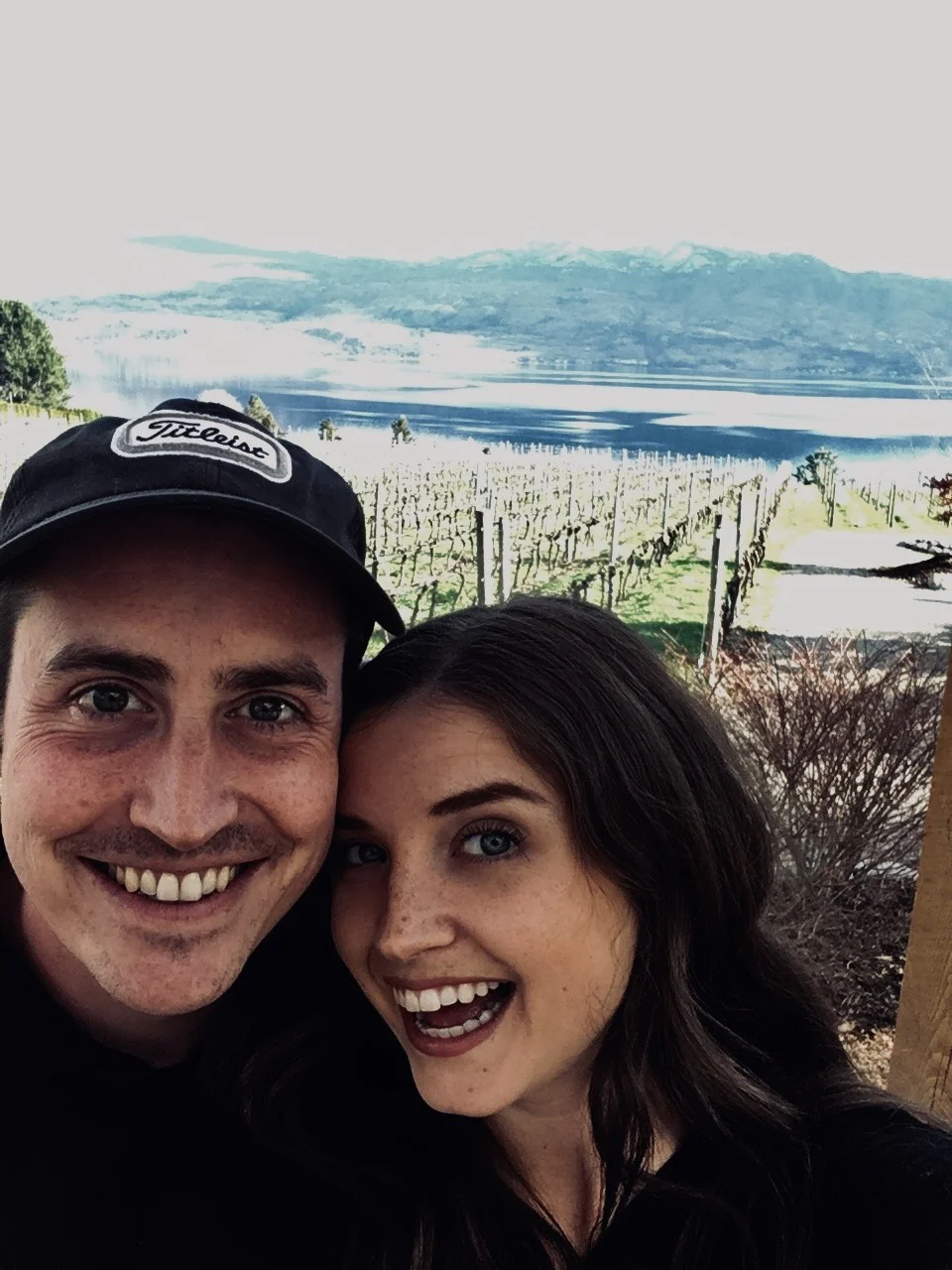 Smiling faces in the vineyard after Happy Hour at Quails’ Gate Winery