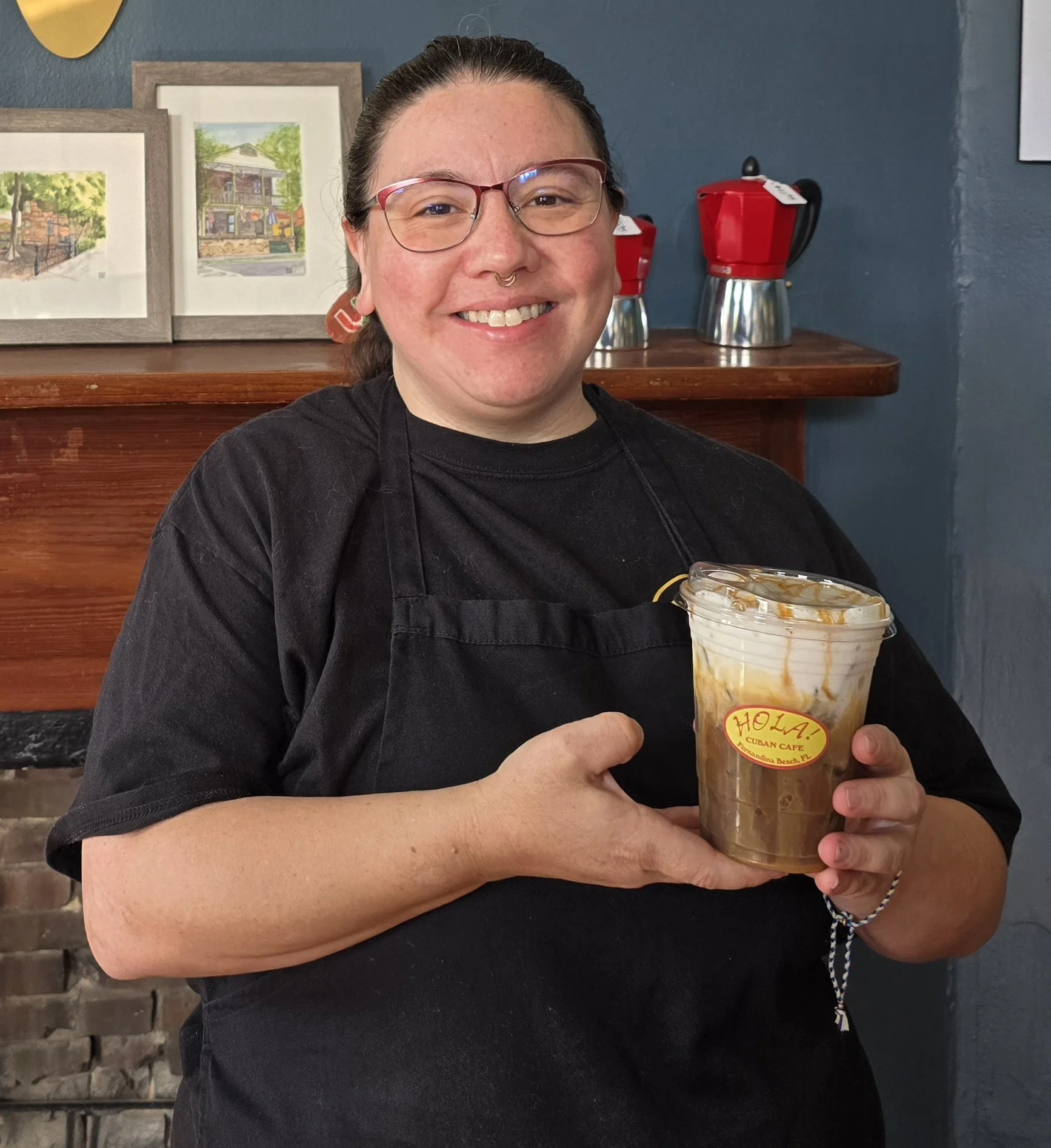 friendly-hola-employee-with-iced-cafe-con-leche-fernandina-beach.jpg