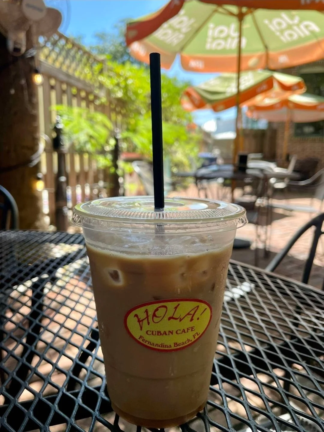iced-cafe-con-leche-on-patio-hola-cuban-cafe-amelia-island.jpg