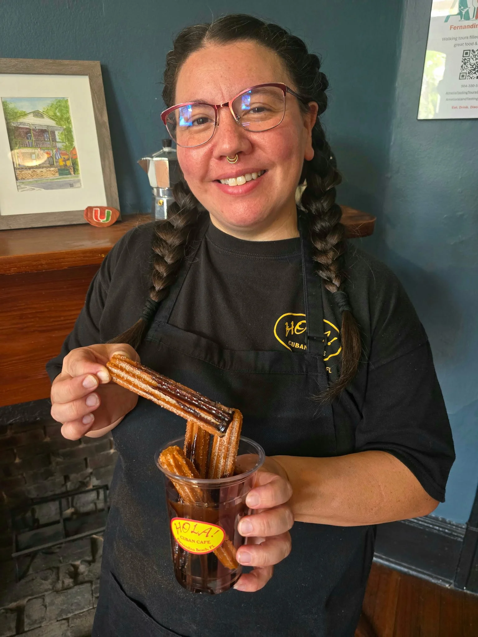 mercy-serving-chocolate-churros-hola-cuban-cafe-fernandina-beach-amelia-island.jpg