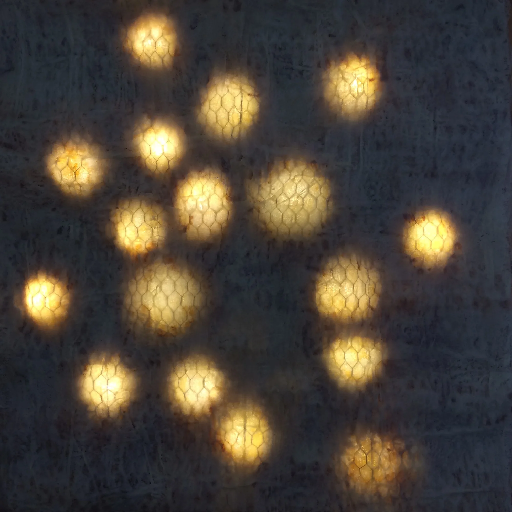  [illuminated]  Chicken wire, cheesecloth, shellac, and beeswax.  48 x 48 inches  2017 