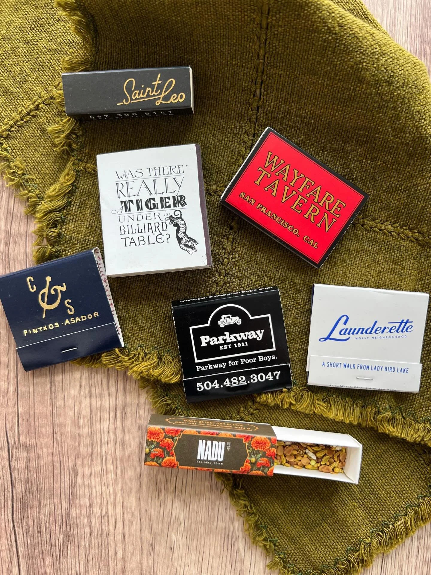 I wrote about restaurant matchbooks, and why I - someone who emphatically does not collect things - has been saving them for years. These lovely pieces of merch (along with restaurant postcards and stickers) are tangible reminders of some of my favor