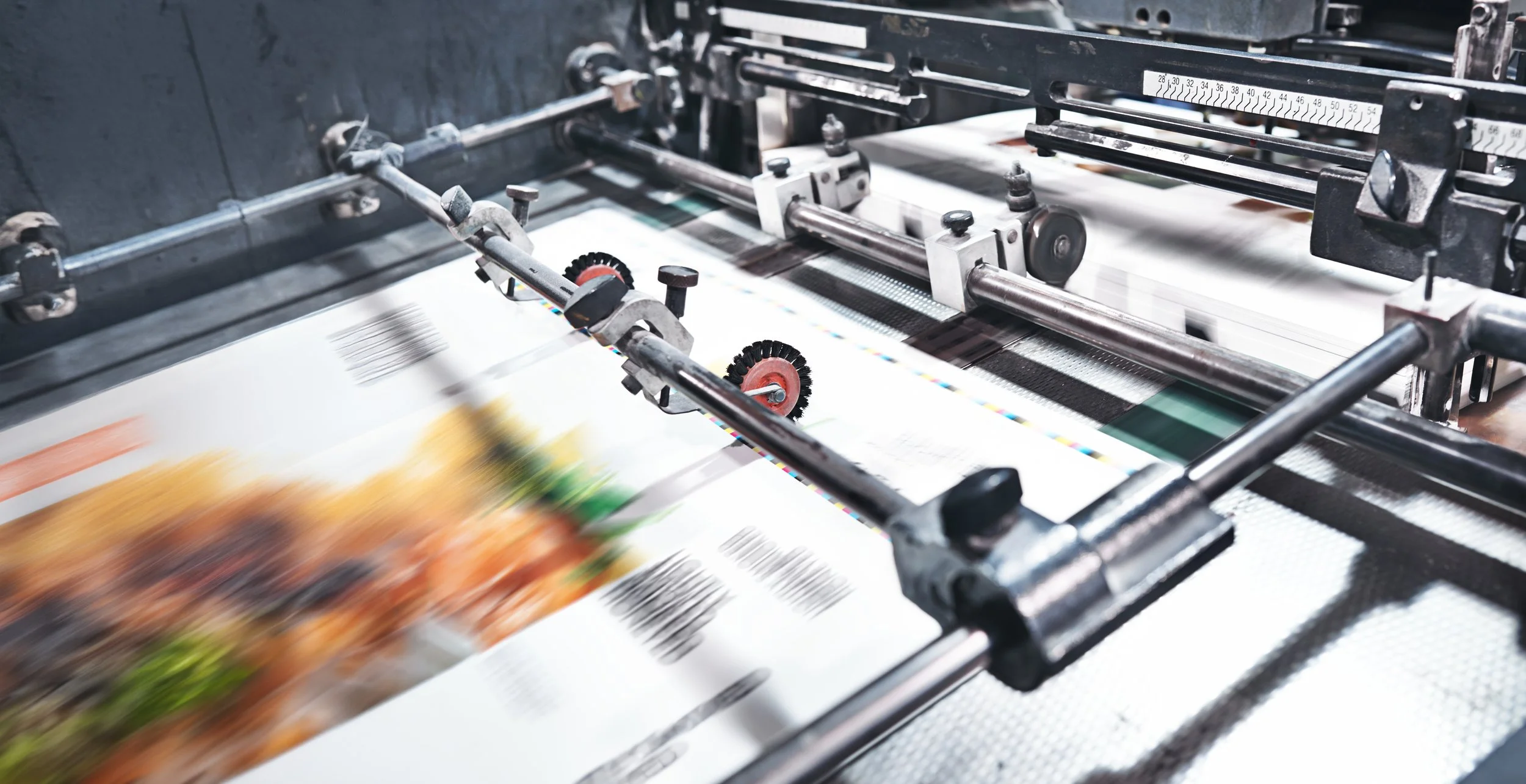 printing-press-machinery-producing-colorful-printe-2026-03-25-06-09-39-utc.jpg