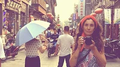 Image of Martina Grossi holding a camera