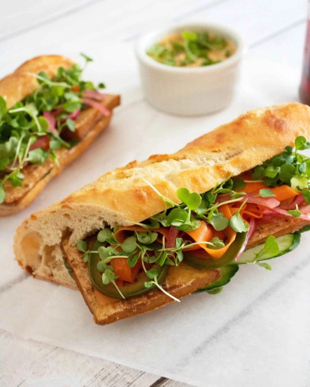 Bright crisp veggies, paired with pressed marinated tofu, and a chewy baguette? Yes, please! Find the recipe for our Banh Mi Tofu Sandwich at the link in our bio! 🥪

#FranklinFarmsFoods #FranklinFarms #PlantBased #Tofu