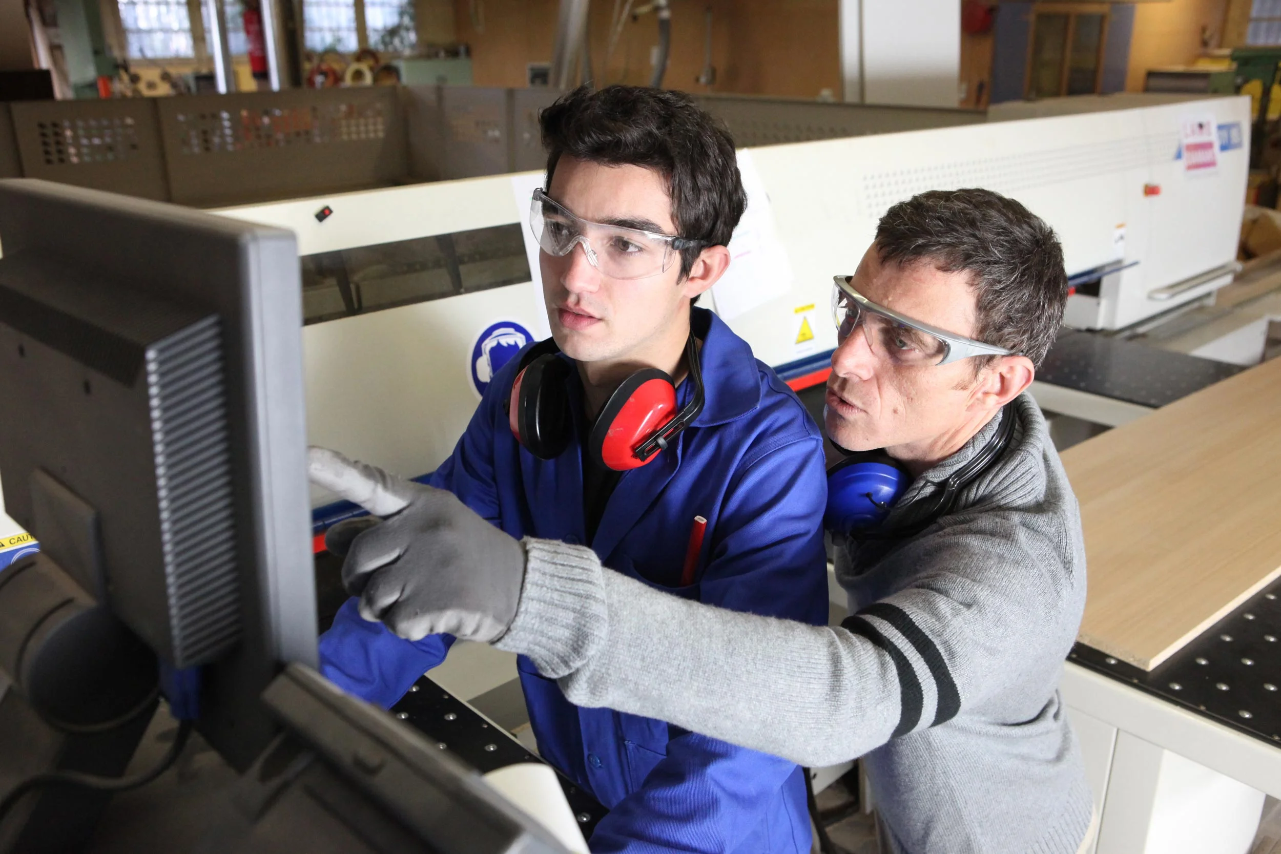 young-apprentice-in-industry-sector-with-tutor.jpg