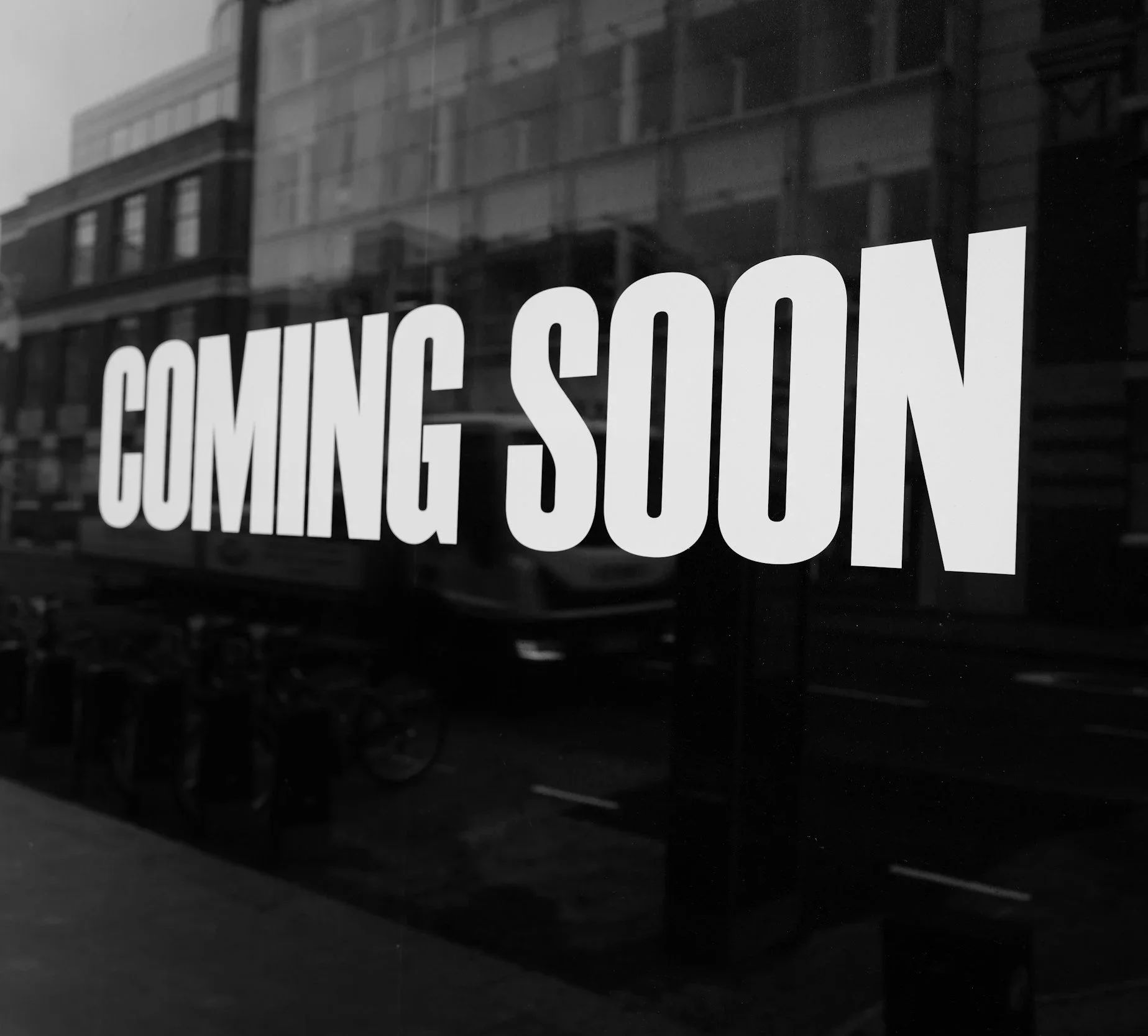 A sign that reads "Coming Soon"