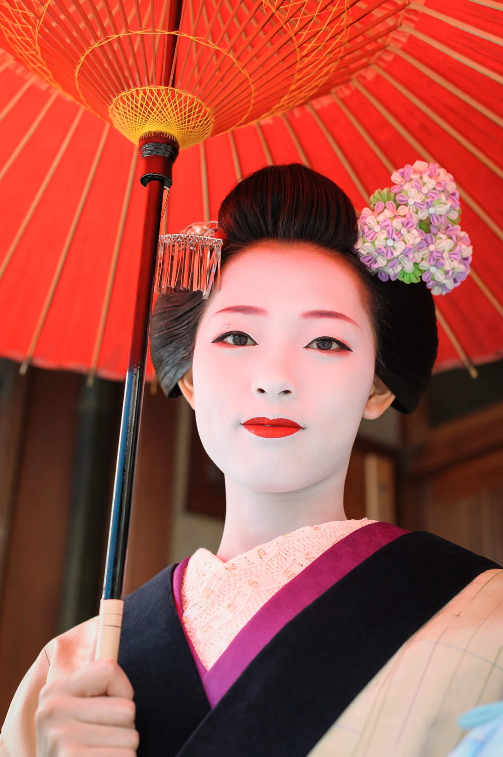 Maiko Takahina with a Red Umbrella