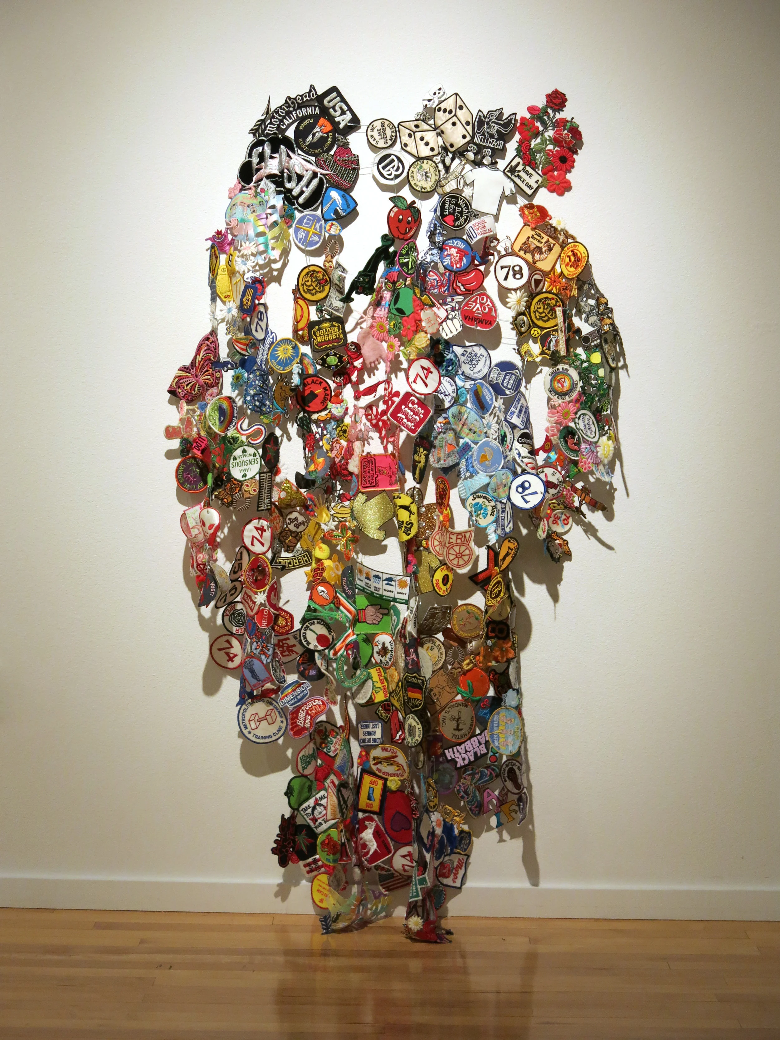 Ash Ferlito, The Propaganda of Individuality, embroidery patches and safety pins, 2014-16. (Image courtesy the artist and the Marjorie Barrick Museum).